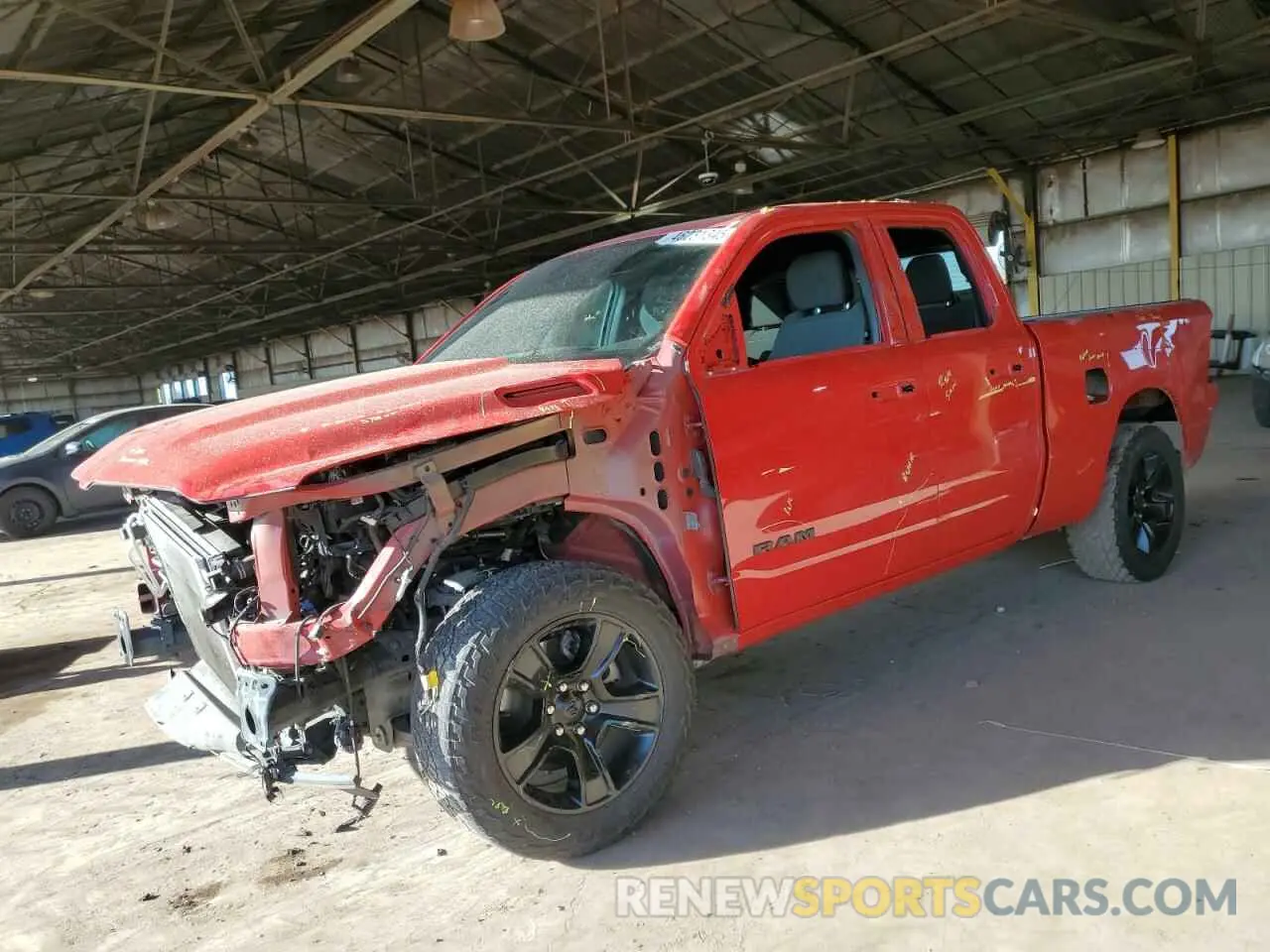 1 Photograph of a damaged car 1C6RREBT9NN173230 RAM 1500 2022