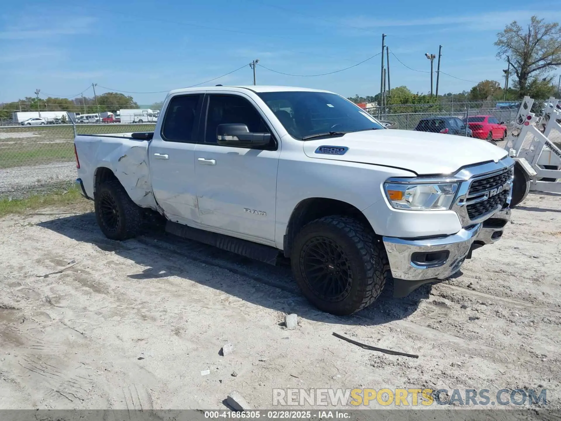 1 Photograph of a damaged car 1C6RREBT9NN260965 RAM 1500 2022