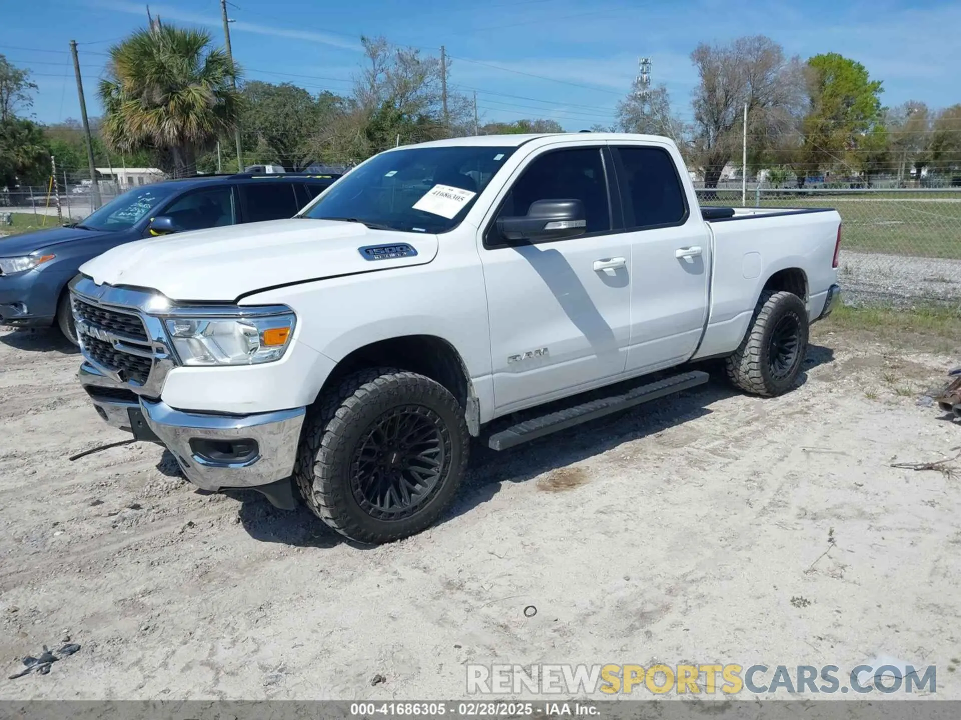2 Photograph of a damaged car 1C6RREBT9NN260965 RAM 1500 2022