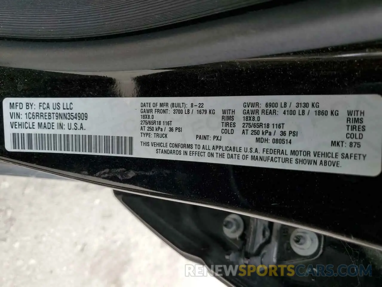 13 Photograph of a damaged car 1C6RREBT9NN354909 RAM 1500 2022