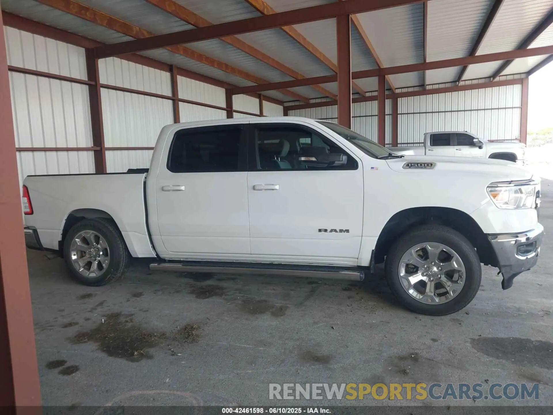 13 Photograph of a damaged car 1C6RREFG2NN446330 RAM 1500 2022