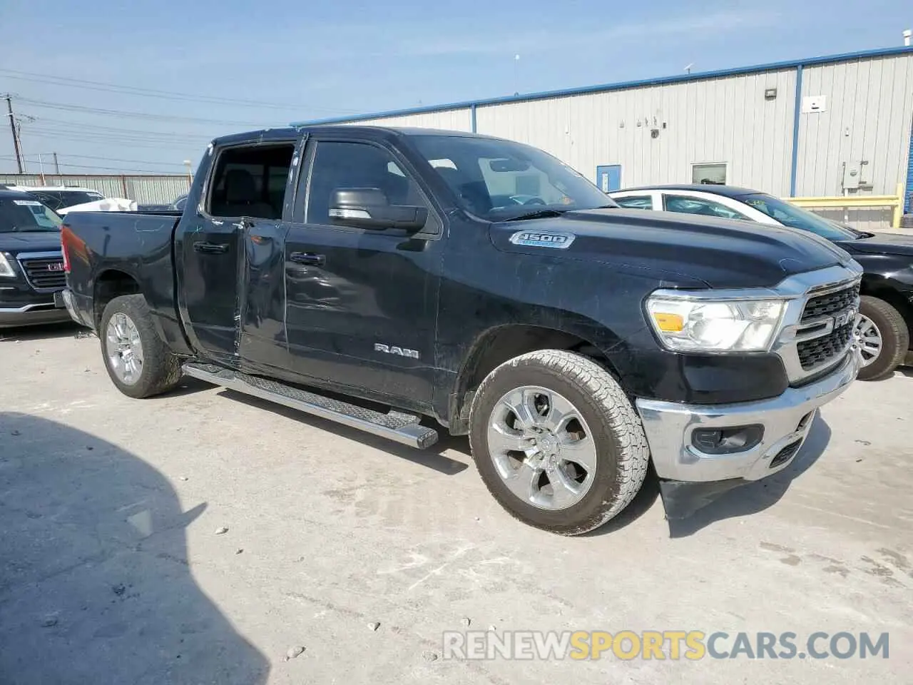 4 Photograph of a damaged car 1C6RREFG4NN202176 RAM 1500 2022