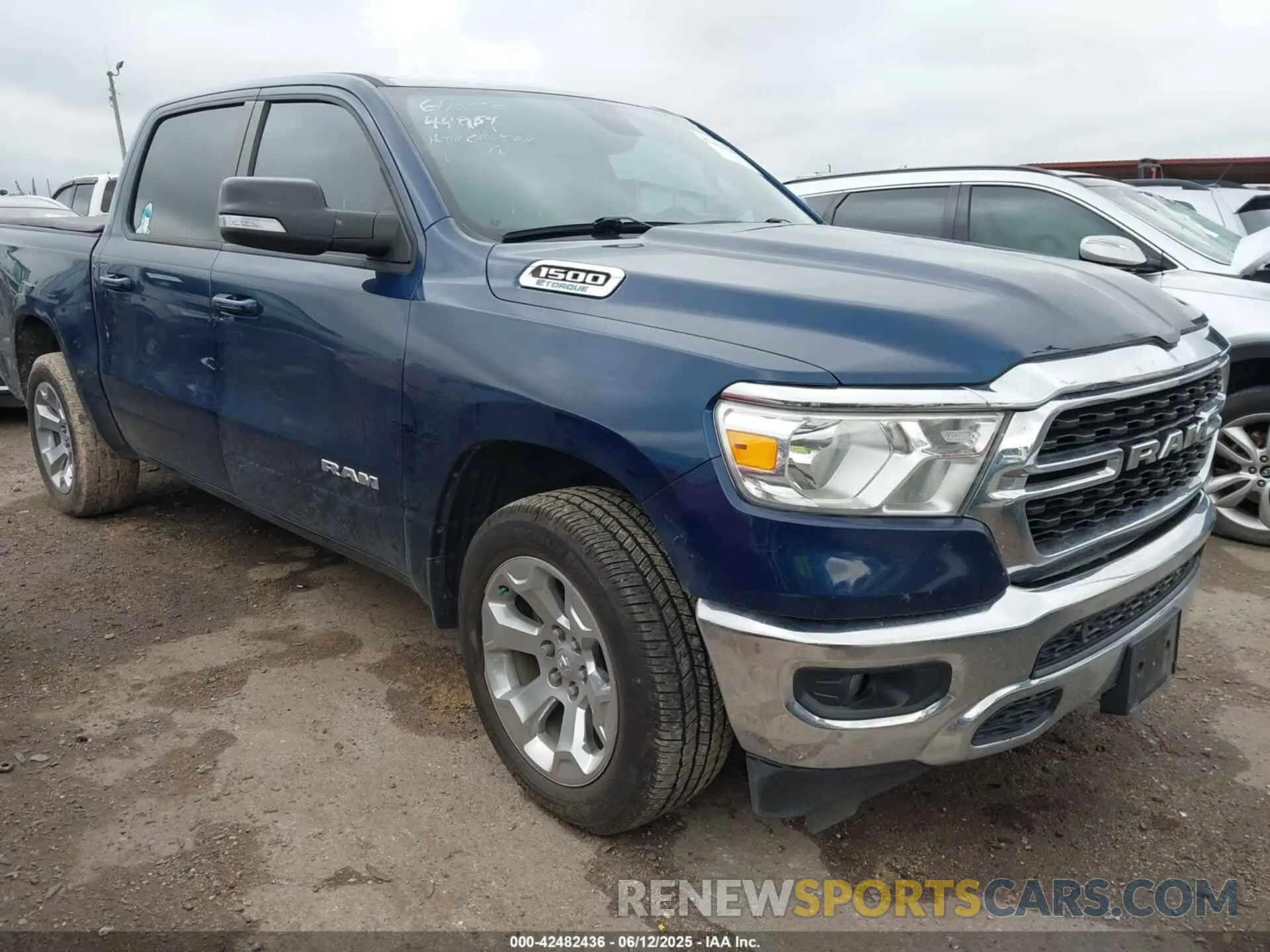 1 Photograph of a damaged car 1C6RREFG6NN261357 RAM 1500 2022