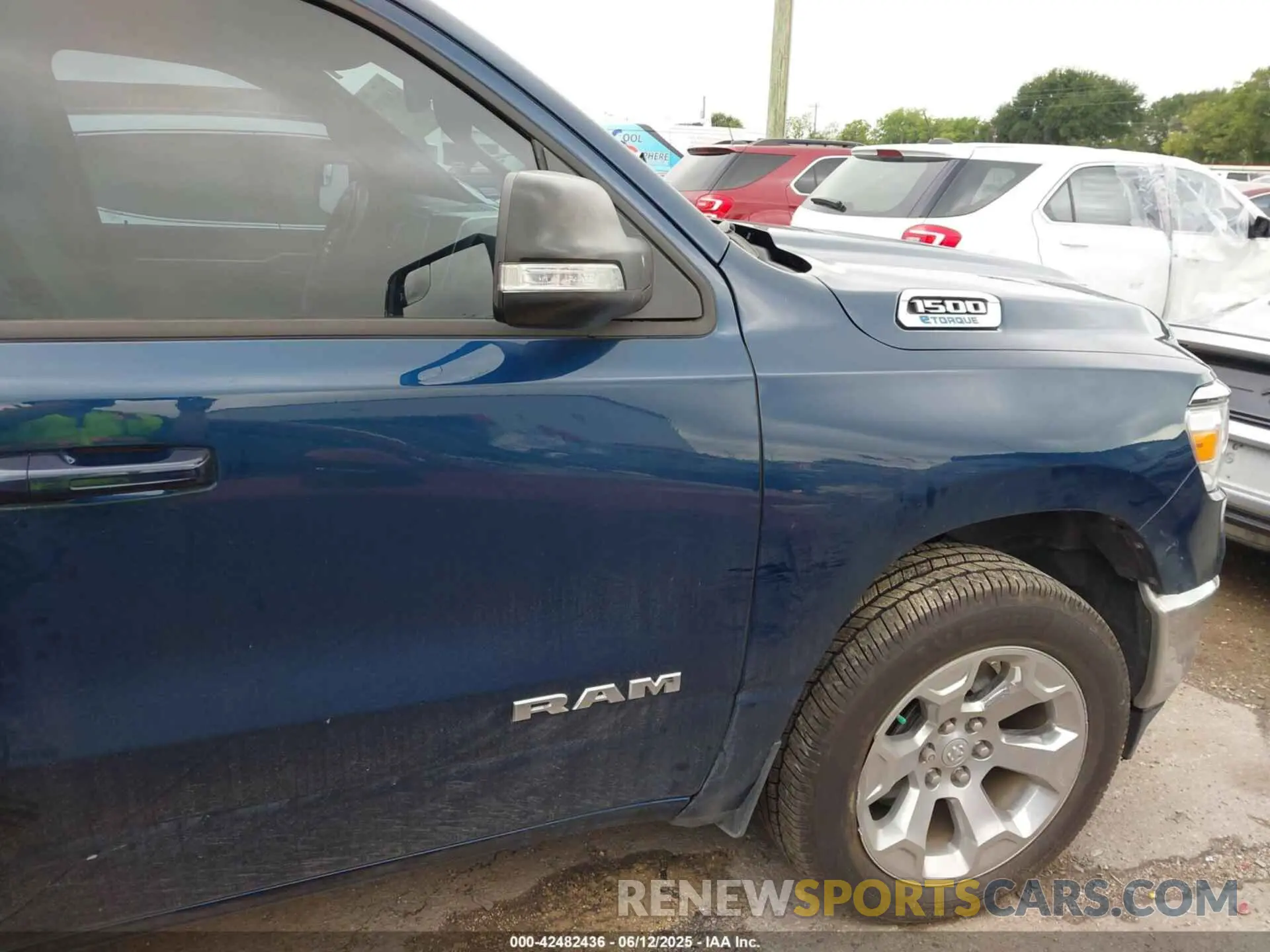 13 Photograph of a damaged car 1C6RREFG6NN261357 RAM 1500 2022