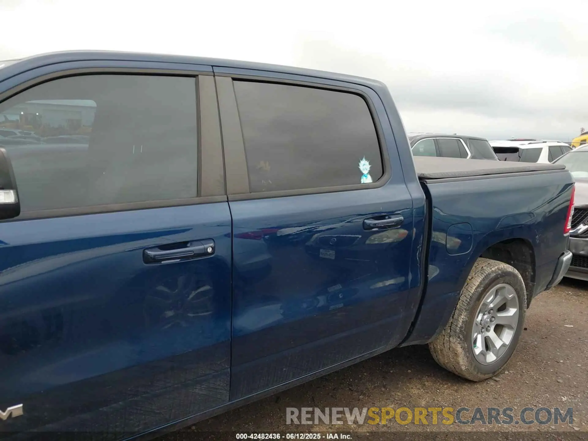 14 Photograph of a damaged car 1C6RREFG6NN261357 RAM 1500 2022