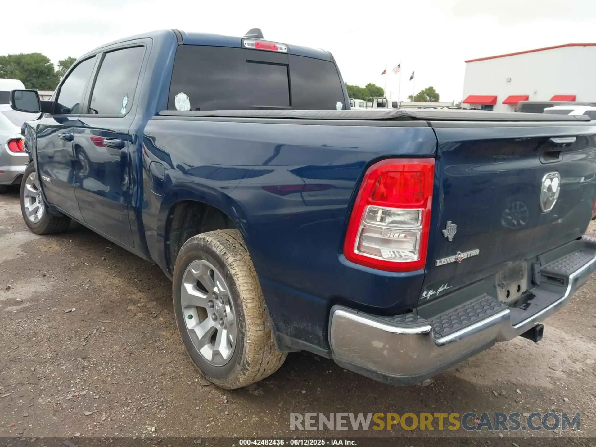 3 Photograph of a damaged car 1C6RREFG6NN261357 RAM 1500 2022