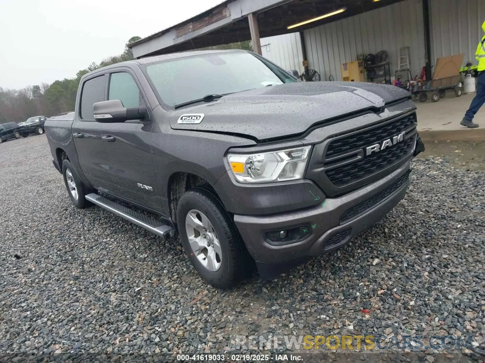 1 Photograph of a damaged car 1C6RREFG6NN337093 RAM 1500 2022