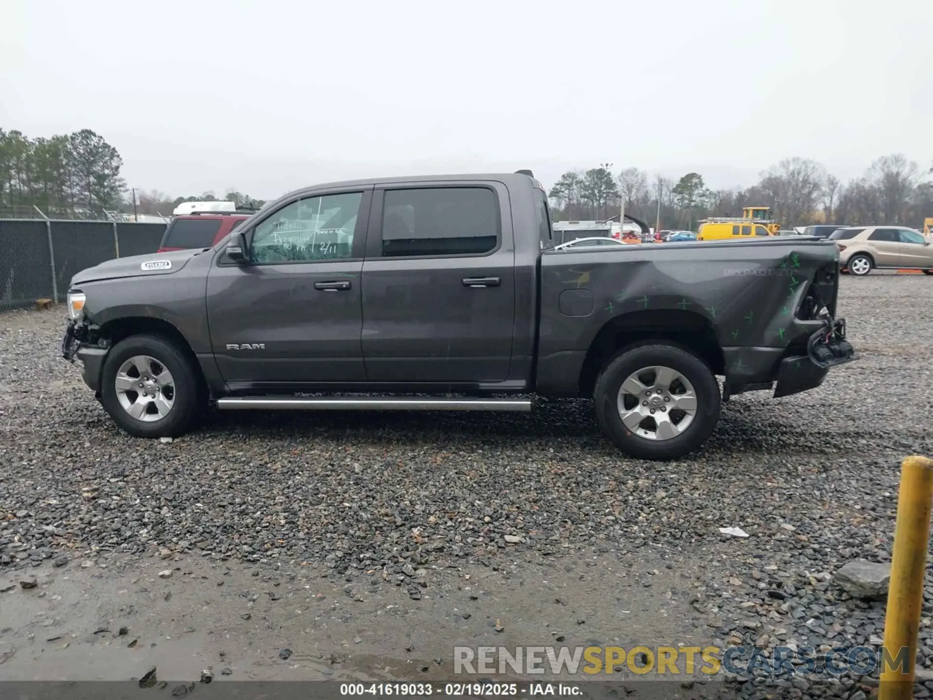 14 Photograph of a damaged car 1C6RREFG6NN337093 RAM 1500 2022