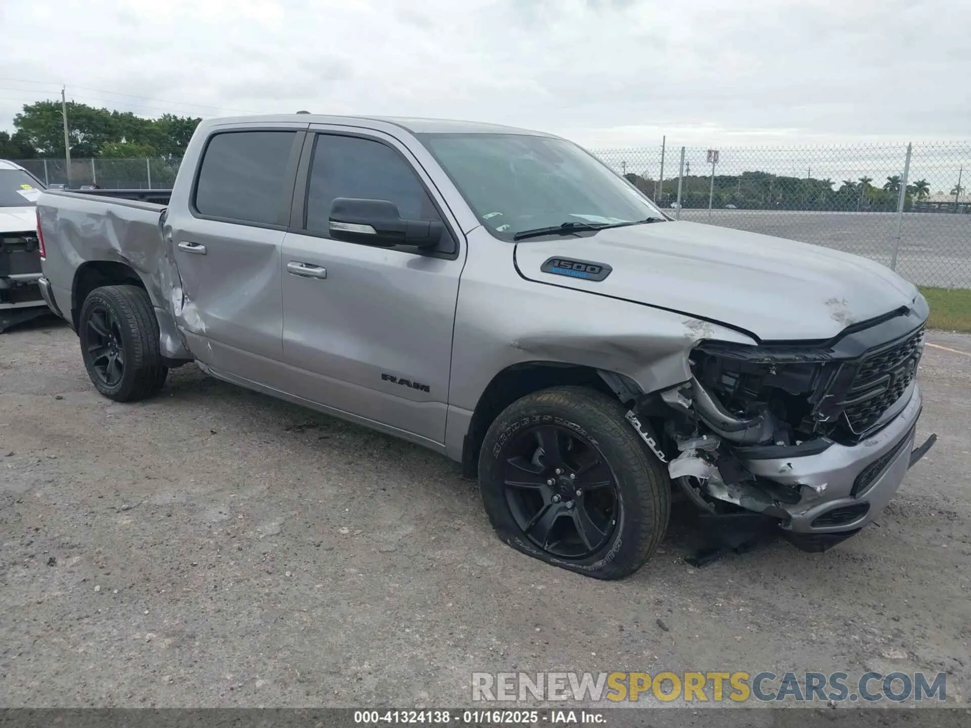 1 Photograph of a damaged car 1C6RREFG8NN326239 RAM 1500 2022