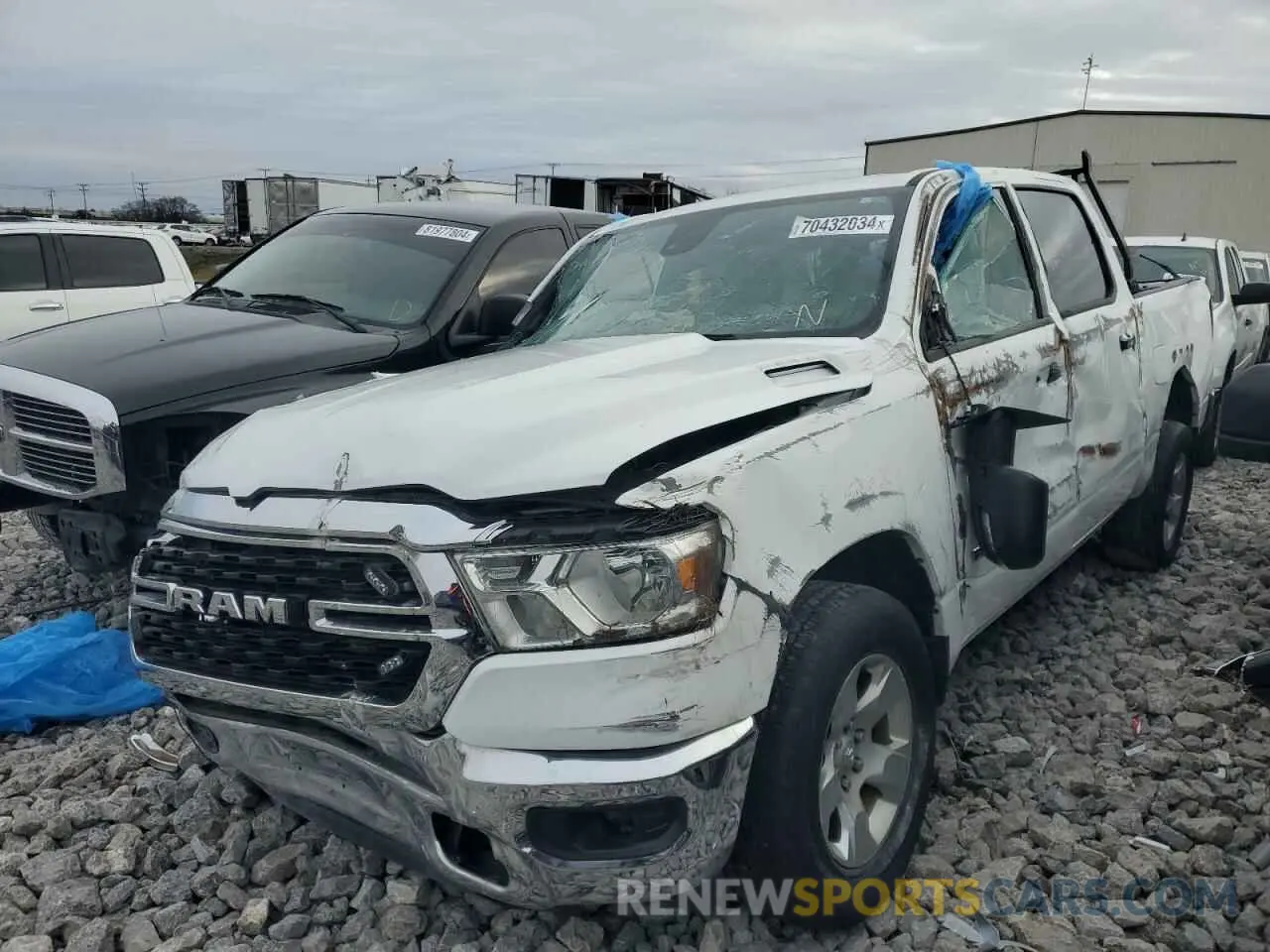 1 Photograph of a damaged car 1C6RREFG9NN382349 RAM 1500 2022