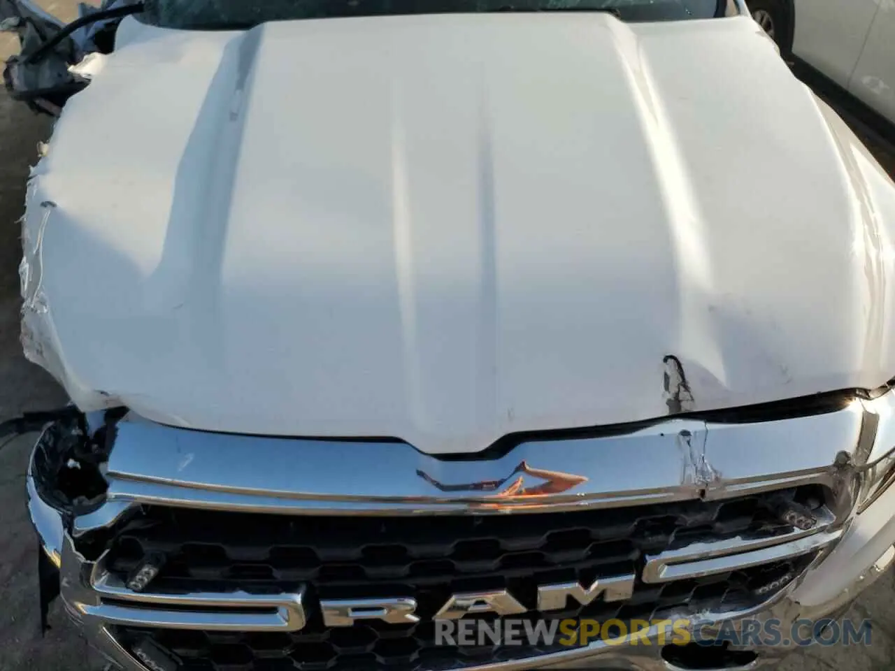 12 Photograph of a damaged car 1C6RREFG9NN382349 RAM 1500 2022