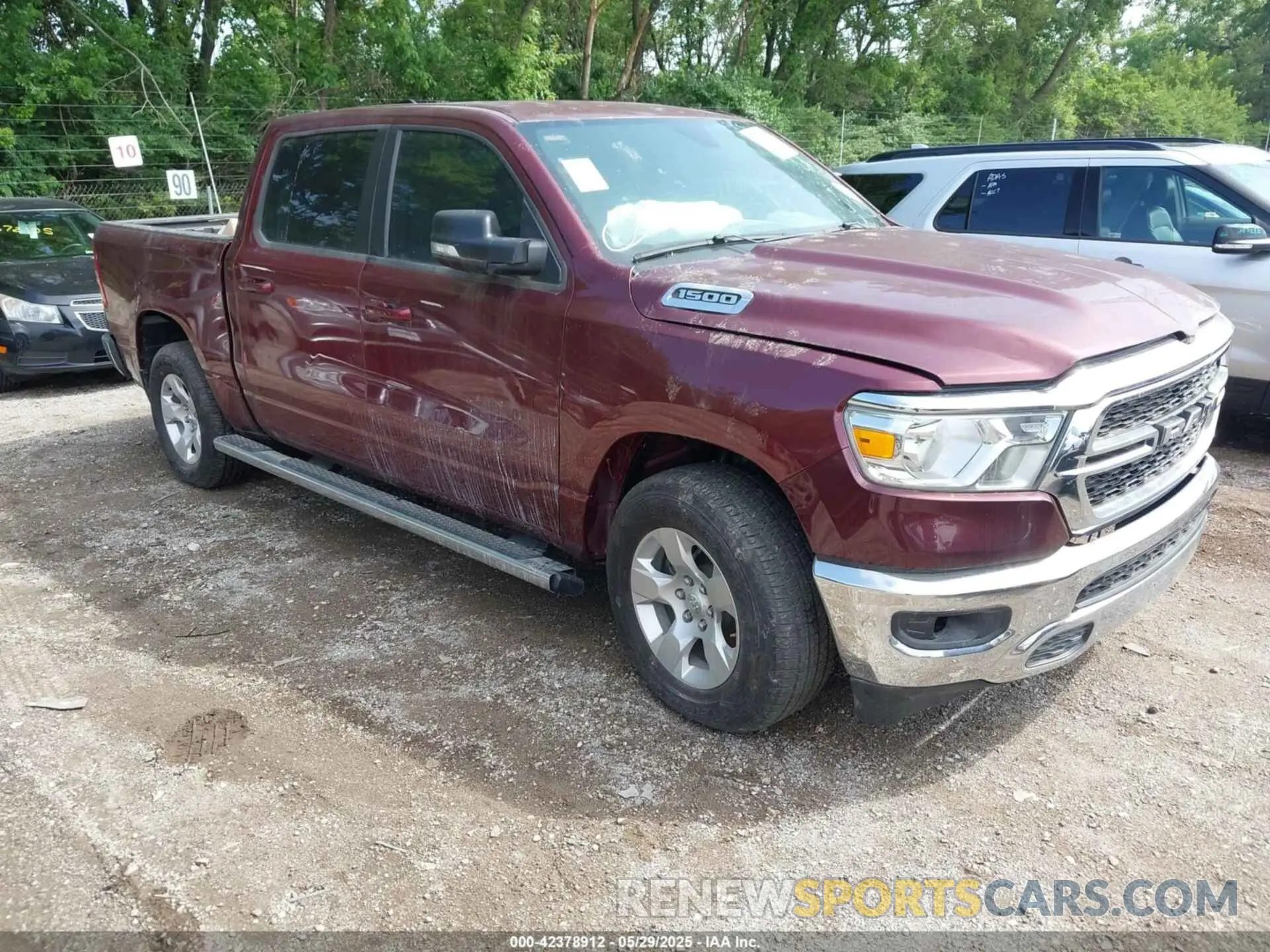 1 Photograph of a damaged car 1C6RREFM1NN254323 RAM 1500 2022