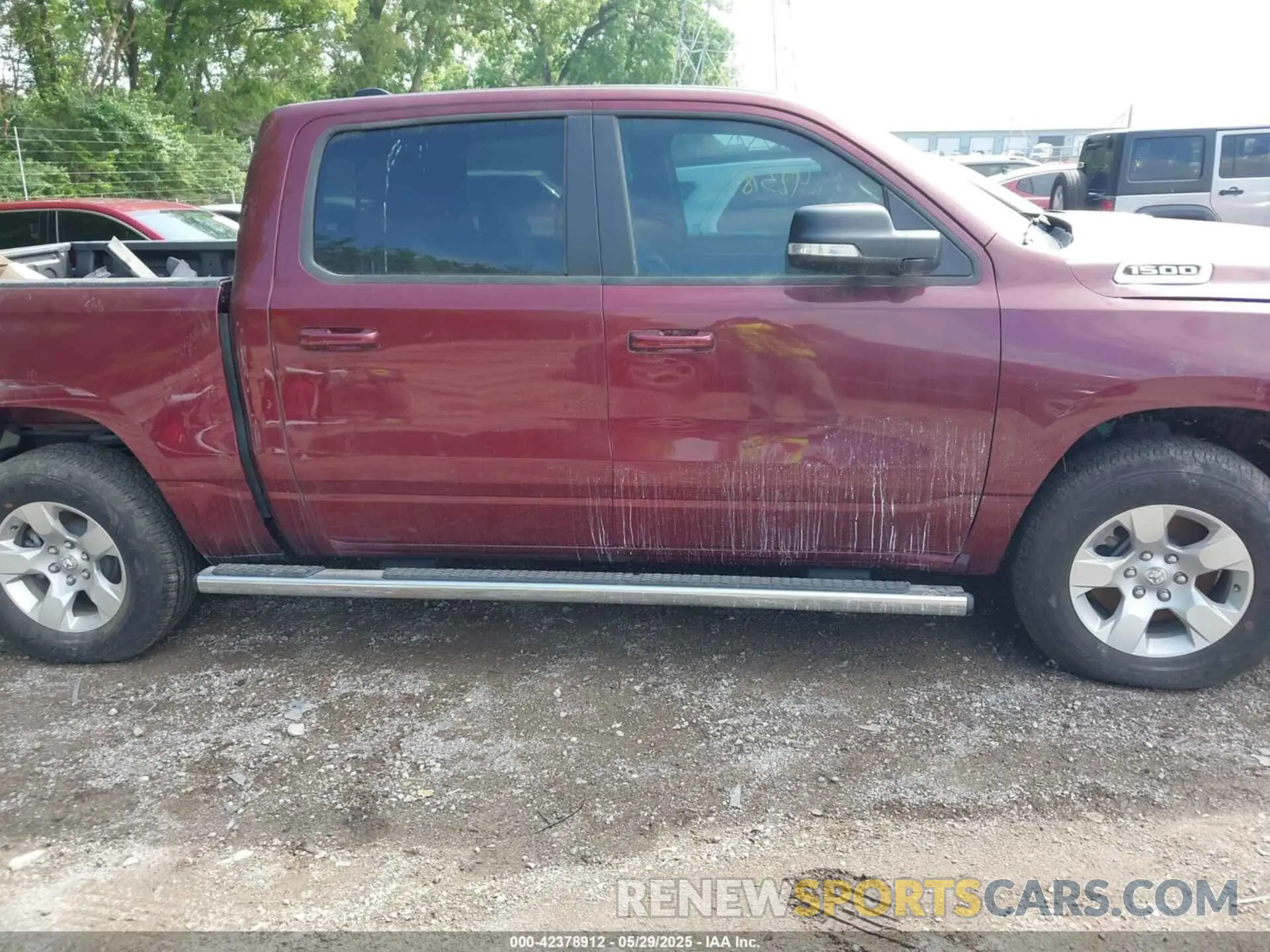 13 Photograph of a damaged car 1C6RREFM1NN254323 RAM 1500 2022