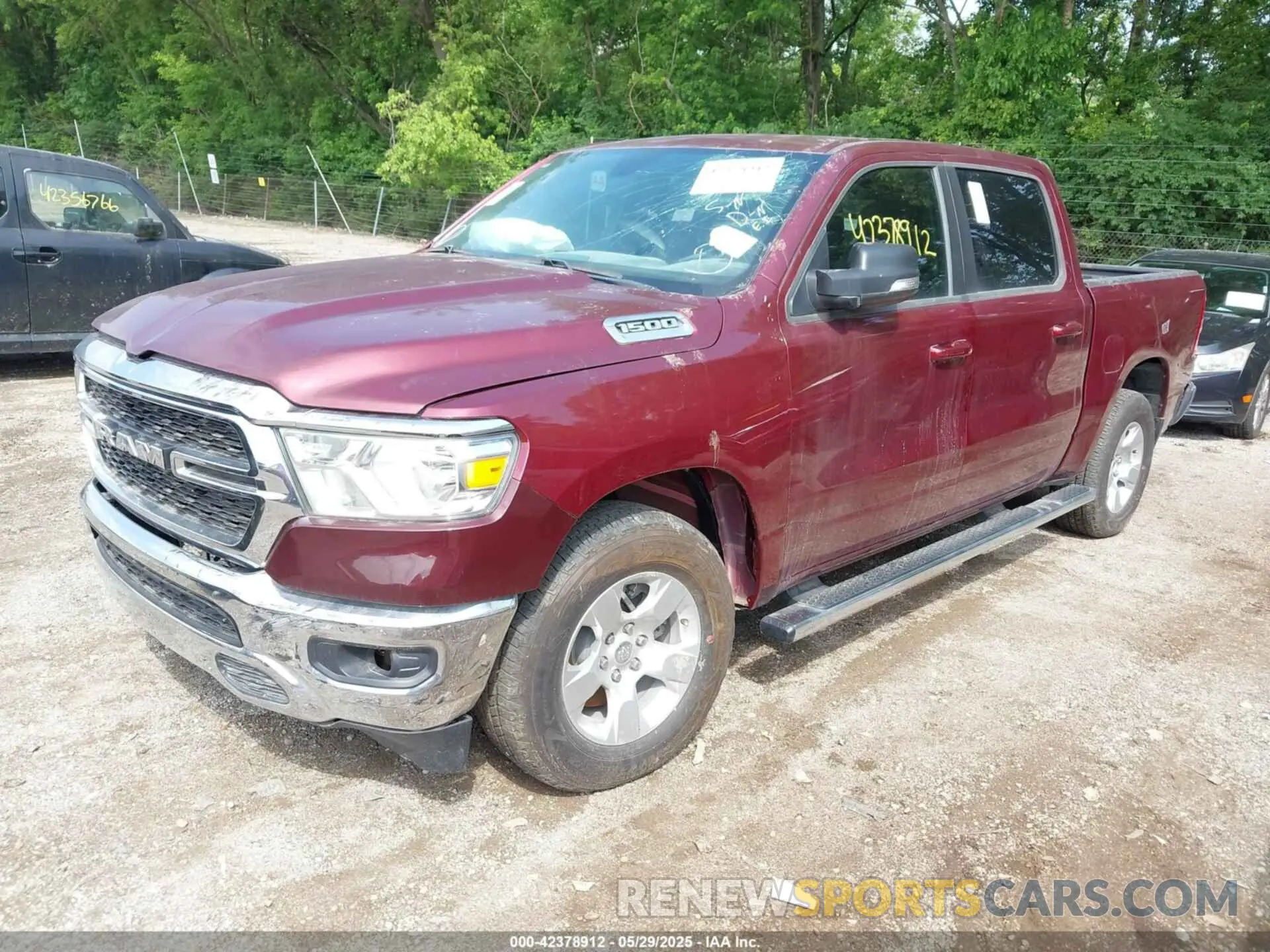 2 Photograph of a damaged car 1C6RREFM1NN254323 RAM 1500 2022
