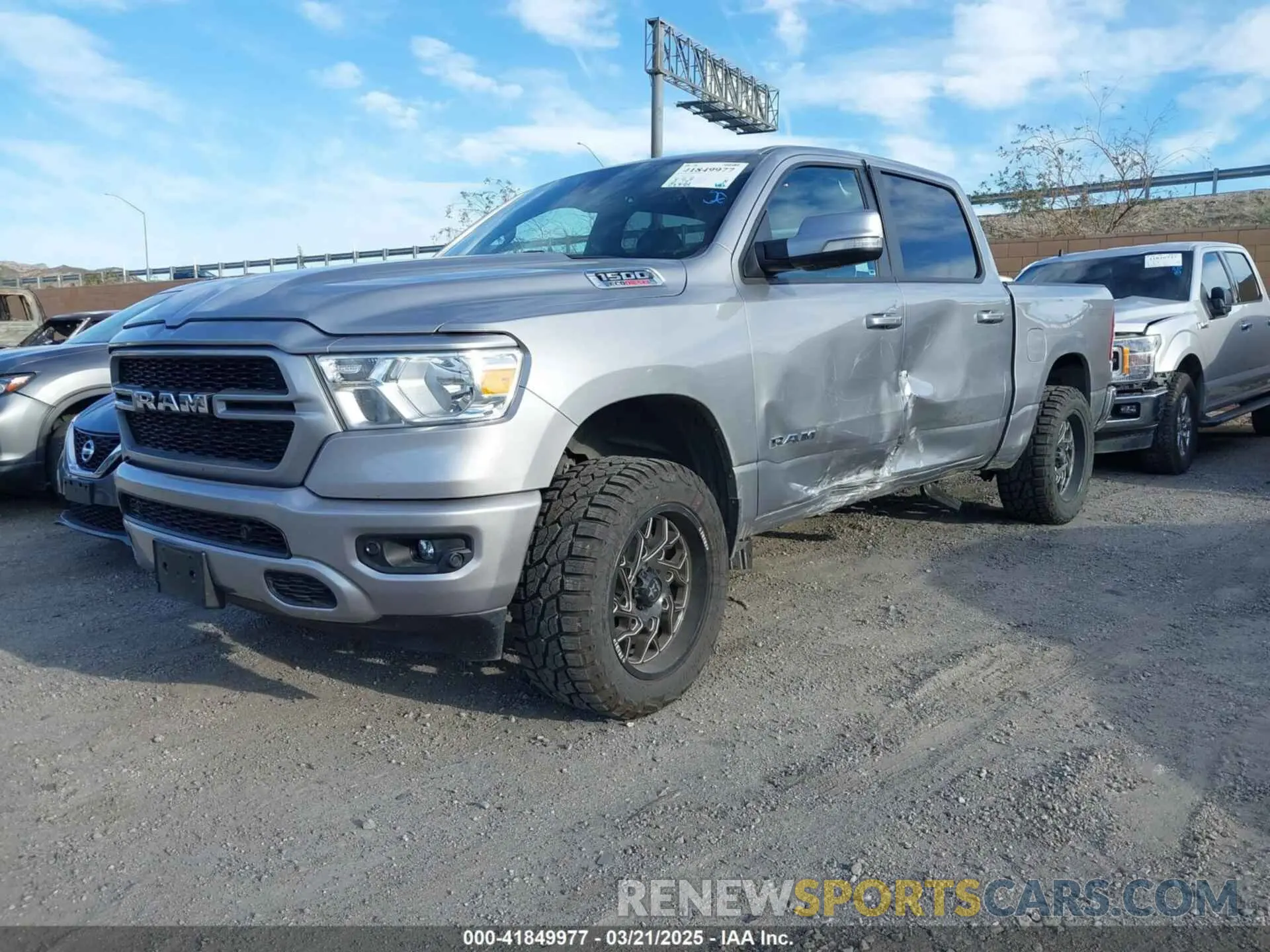 14 Photograph of a damaged car 1C6RREFM2NN479737 RAM 1500 2022