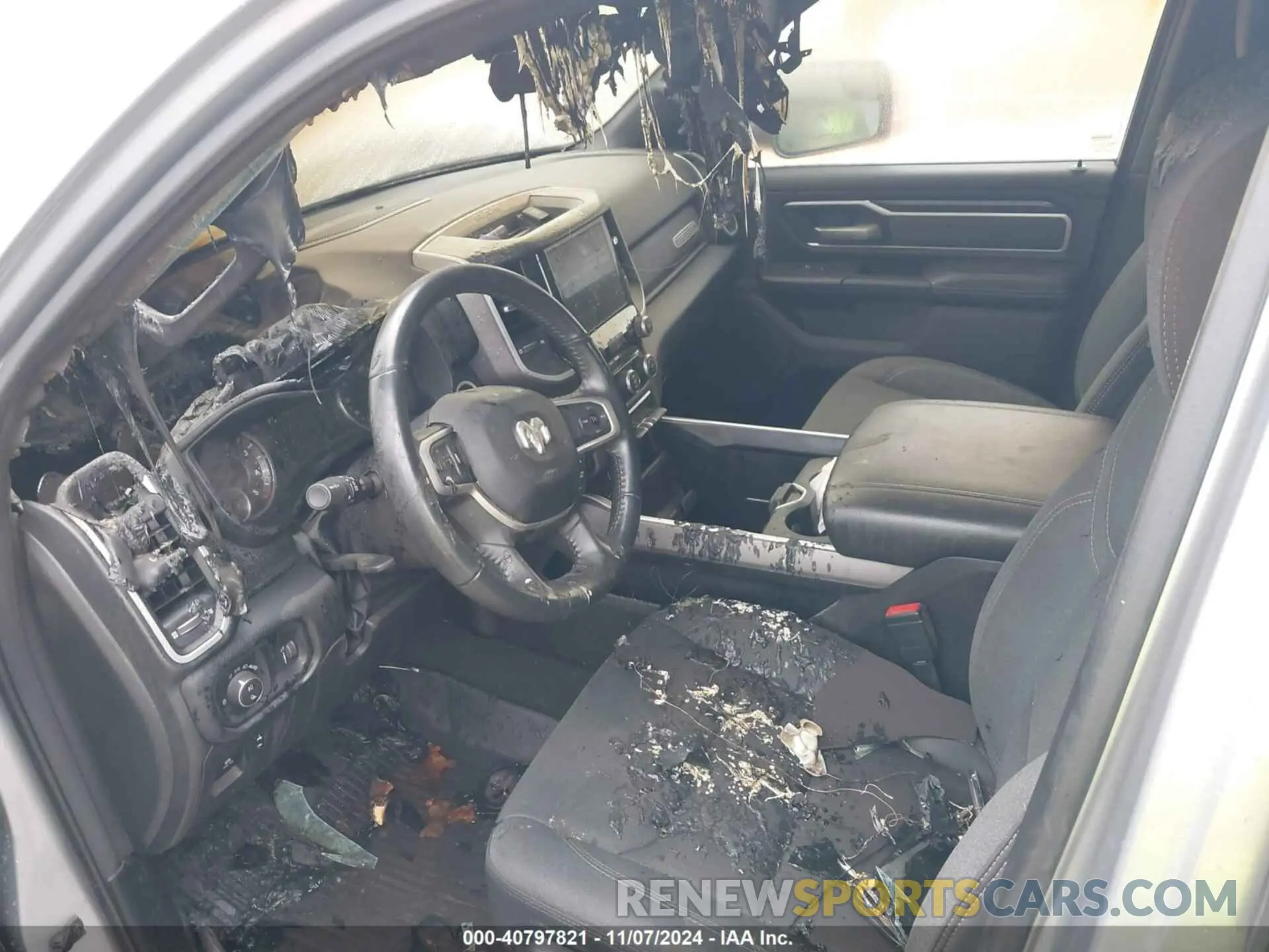 11 Photograph of a damaged car 1C6RREFM6NN408489 RAM 1500 2022