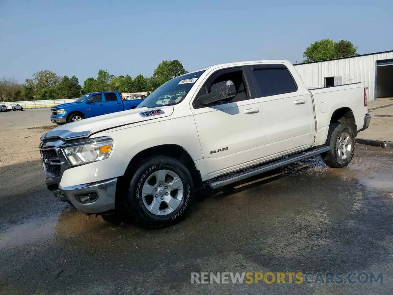 1 Photograph of a damaged car 1C6RREFM9NN446136 RAM 1500 2022