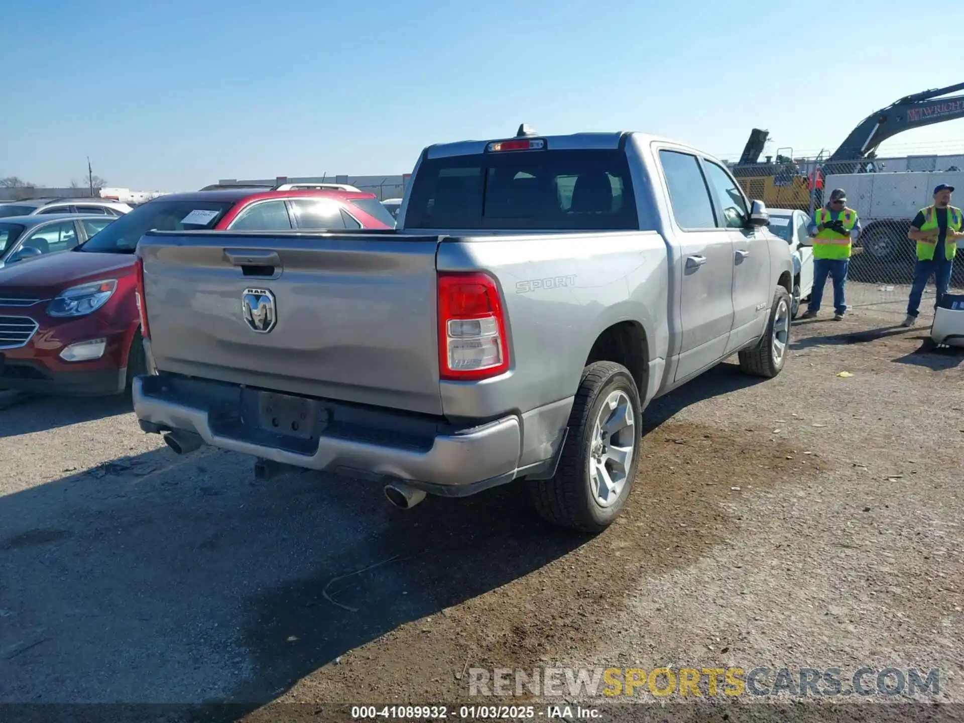 4 Photograph of a damaged car 1C6RREFT0NN431662 RAM 1500 2022