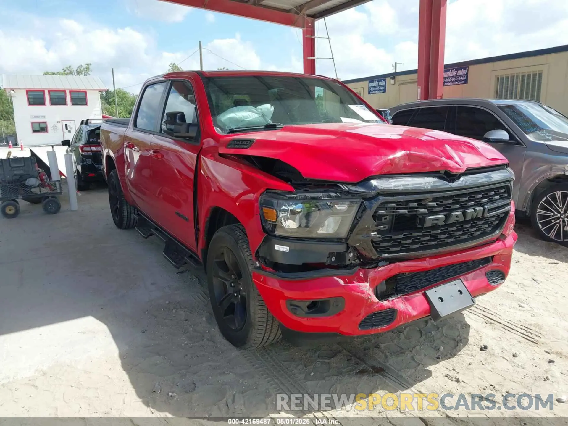1 Photograph of a damaged car 1C6RREFT1NN178299 RAM 1500 2022