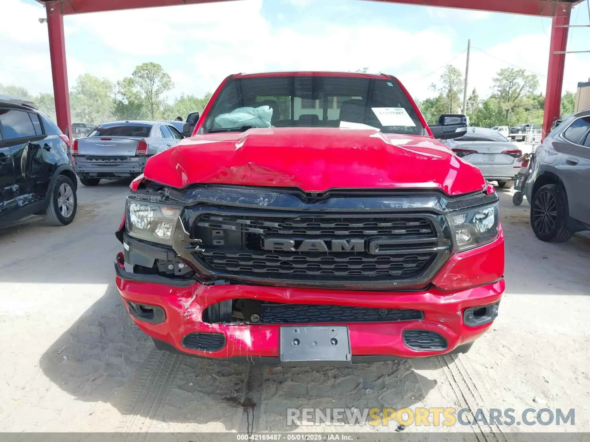 13 Photograph of a damaged car 1C6RREFT1NN178299 RAM 1500 2022