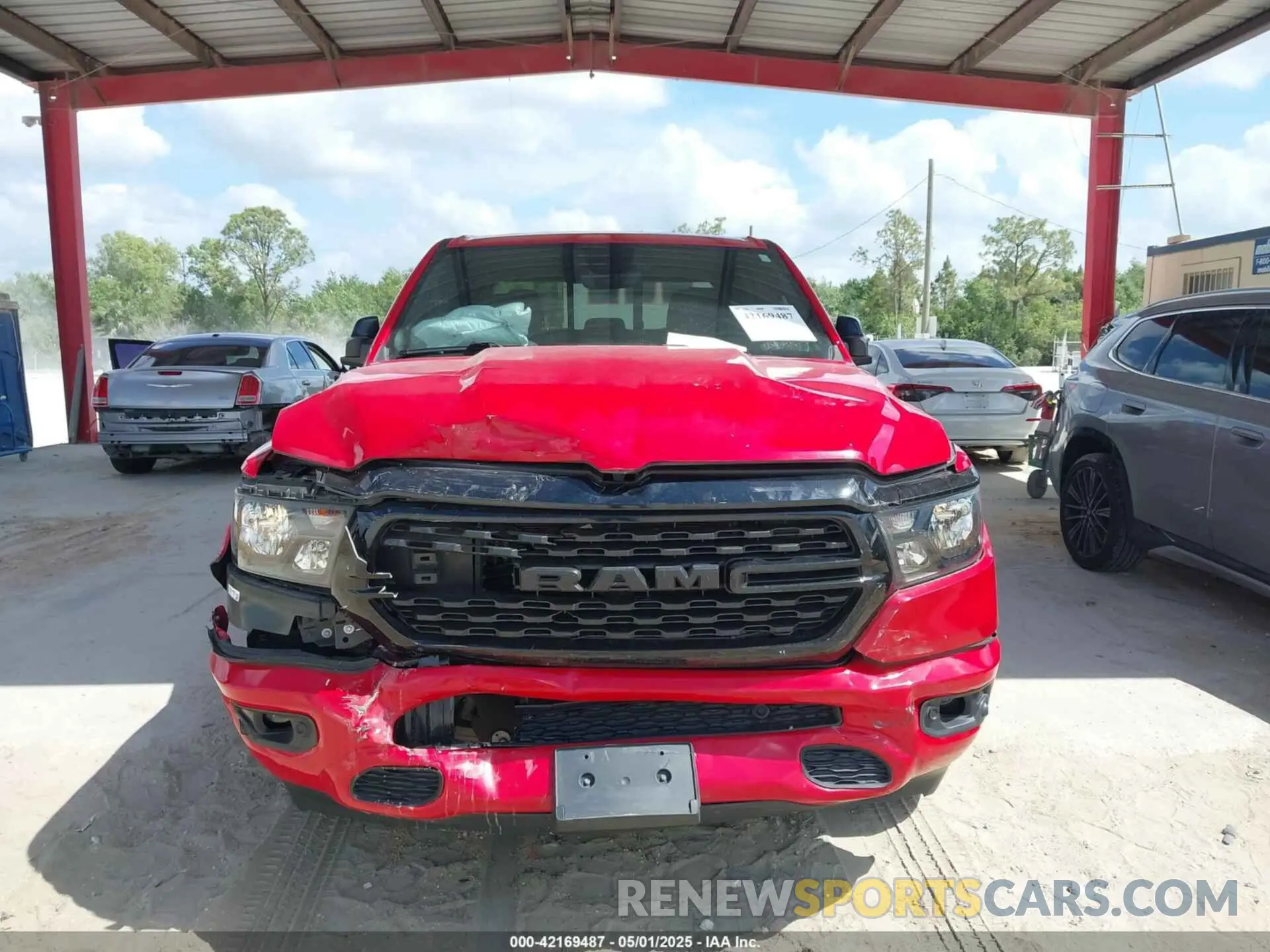 6 Photograph of a damaged car 1C6RREFT1NN178299 RAM 1500 2022