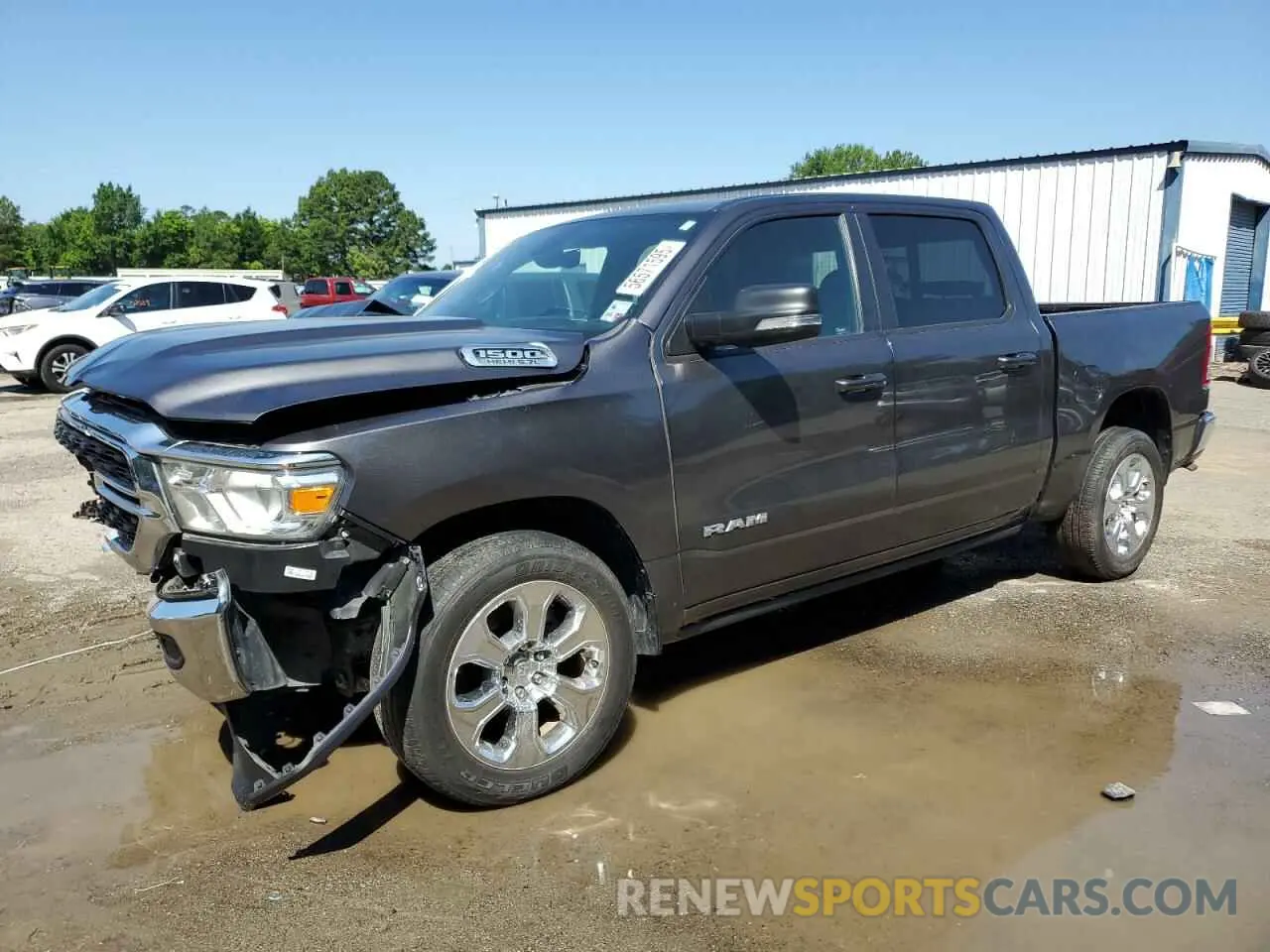 1 Photograph of a damaged car 1C6RREFT2NN173791 RAM 1500 2022