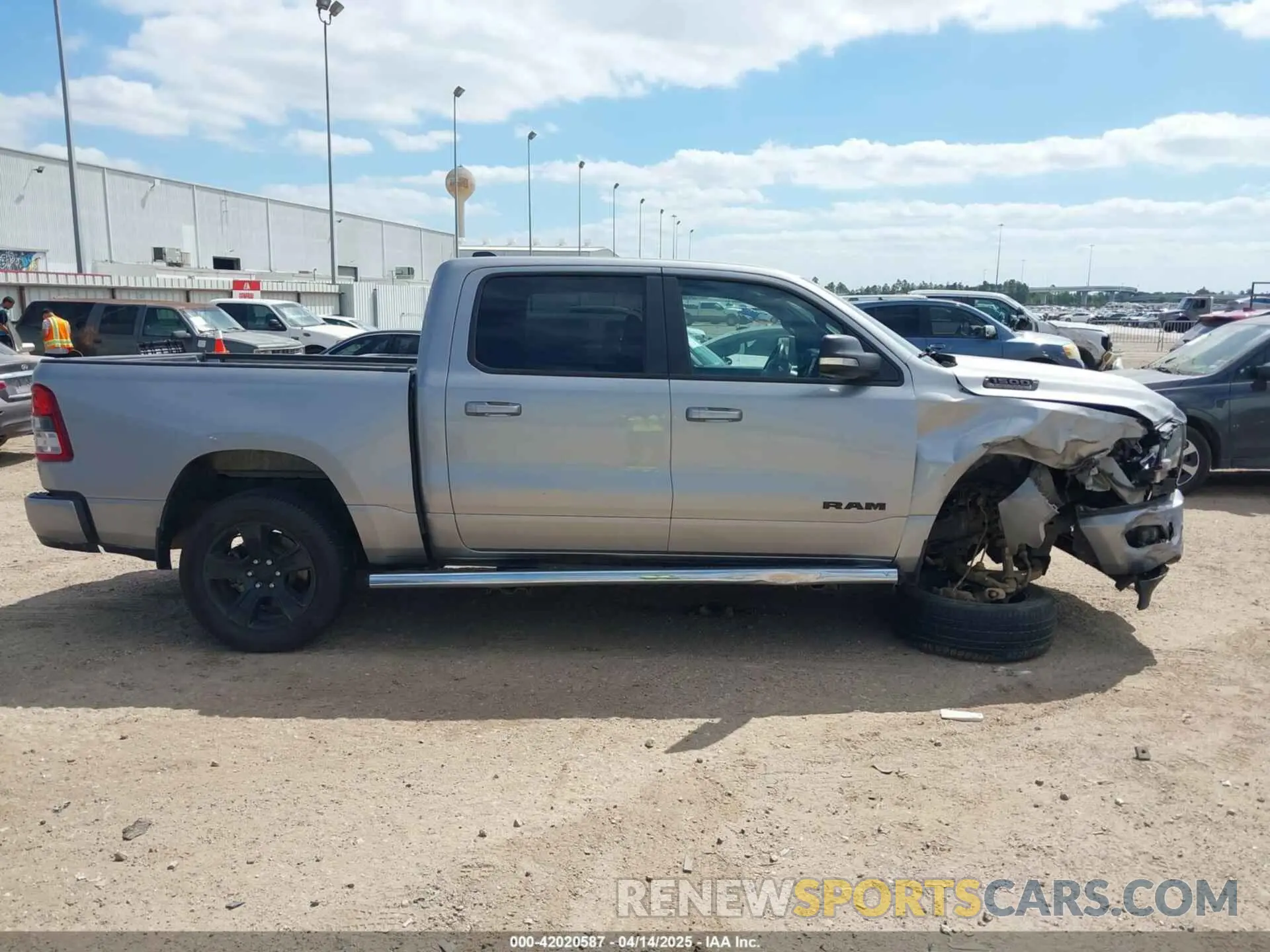 14 Photograph of a damaged car 1C6RREFT2NN253608 RAM 1500 2022