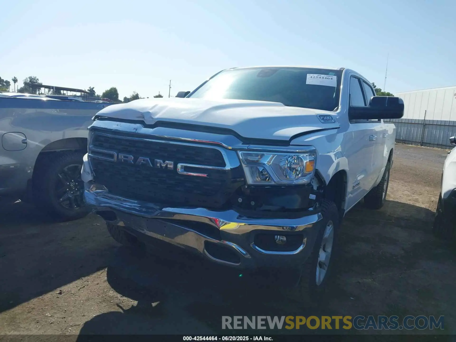 2 Photograph of a damaged car 1C6RREFT2NN261188 RAM 1500 2022