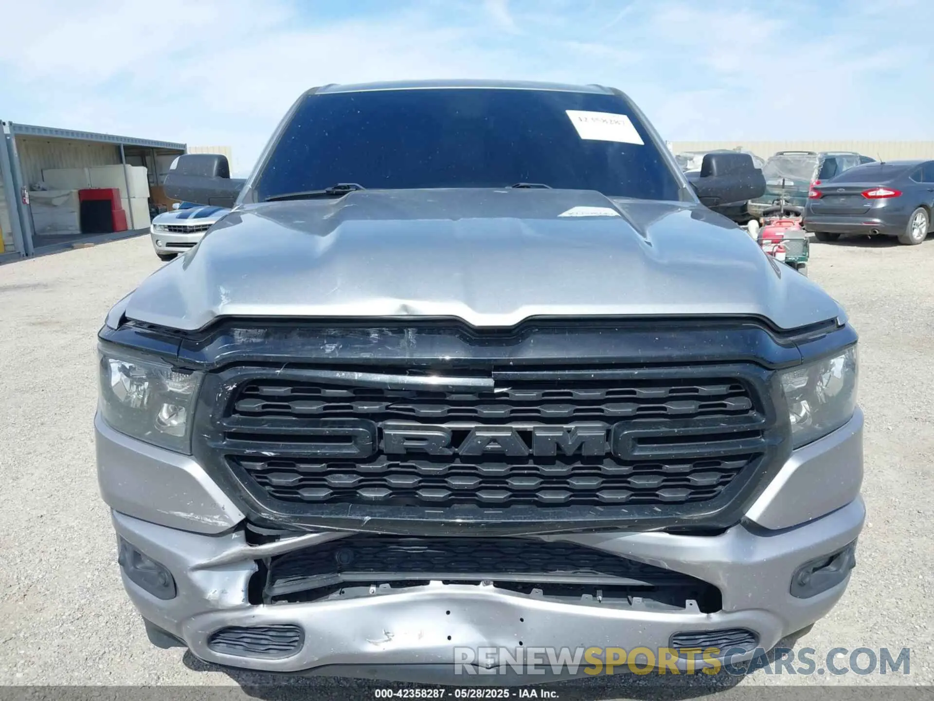 12 Photograph of a damaged car 1C6RREFT3NN157681 RAM 1500 2022