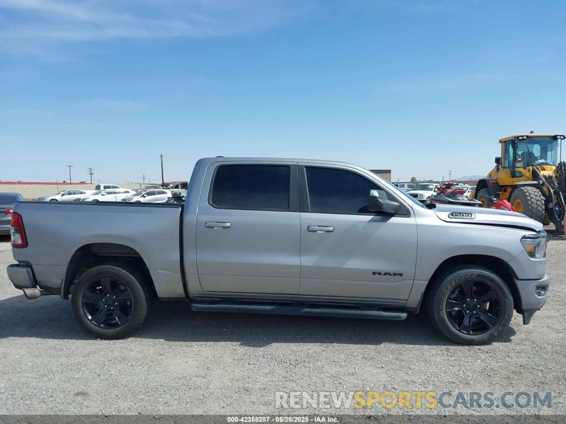 13 Photograph of a damaged car 1C6RREFT3NN157681 RAM 1500 2022
