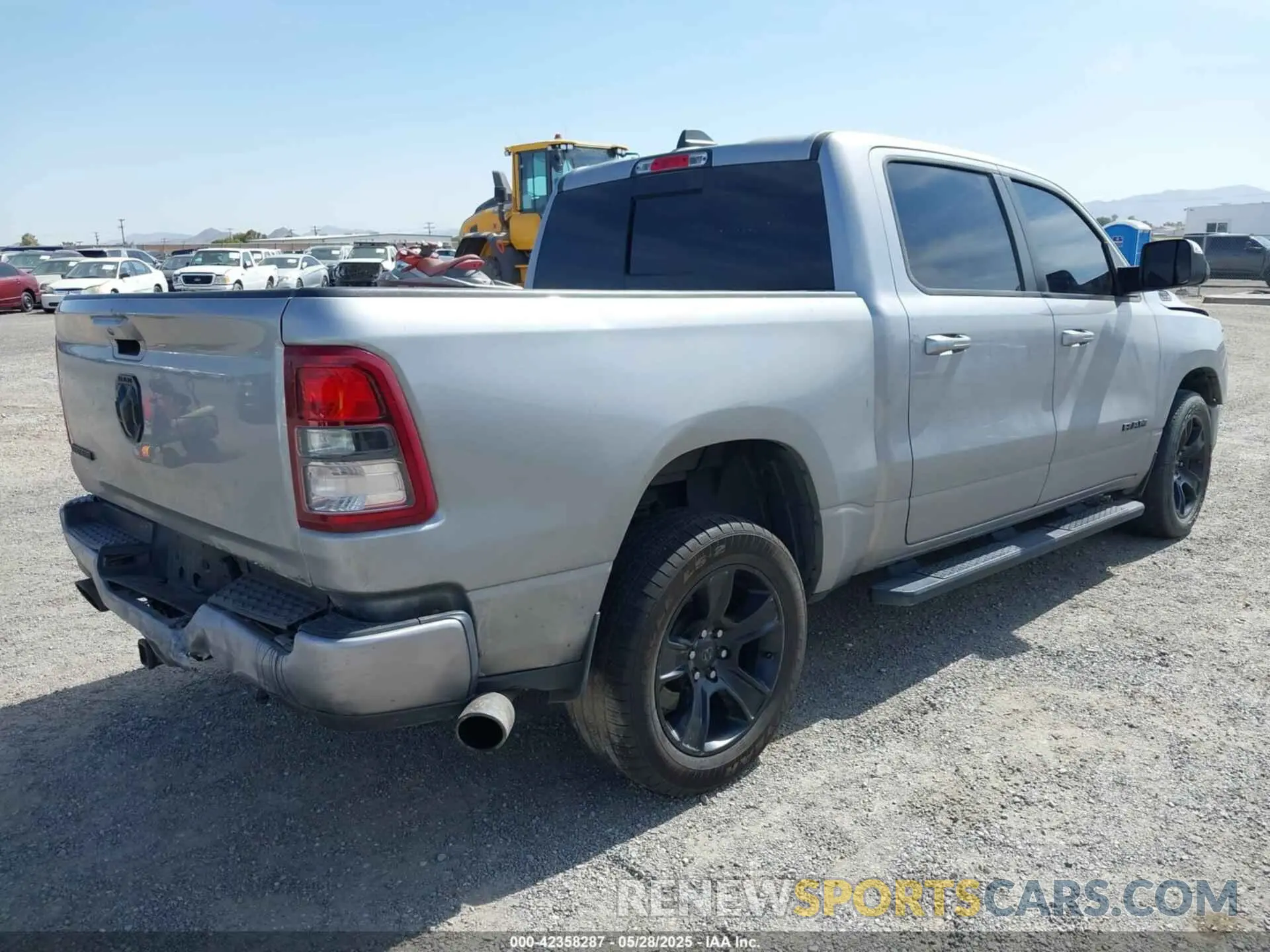 4 Photograph of a damaged car 1C6RREFT3NN157681 RAM 1500 2022