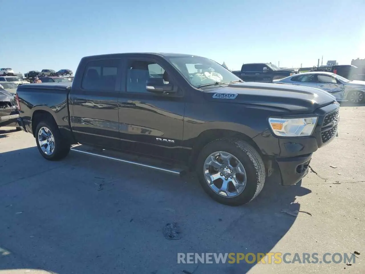 4 Photograph of a damaged car 1C6RREFT3NN337369 RAM 1500 2022