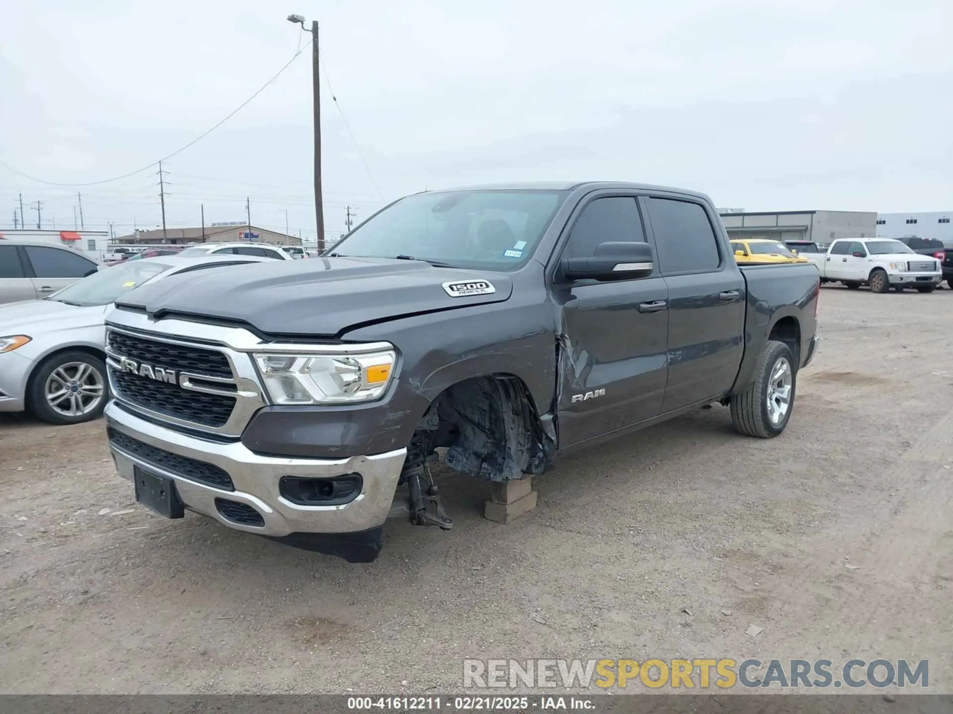 2 Photograph of a damaged car 1C6RREFT3NN372820 RAM 1500 2022