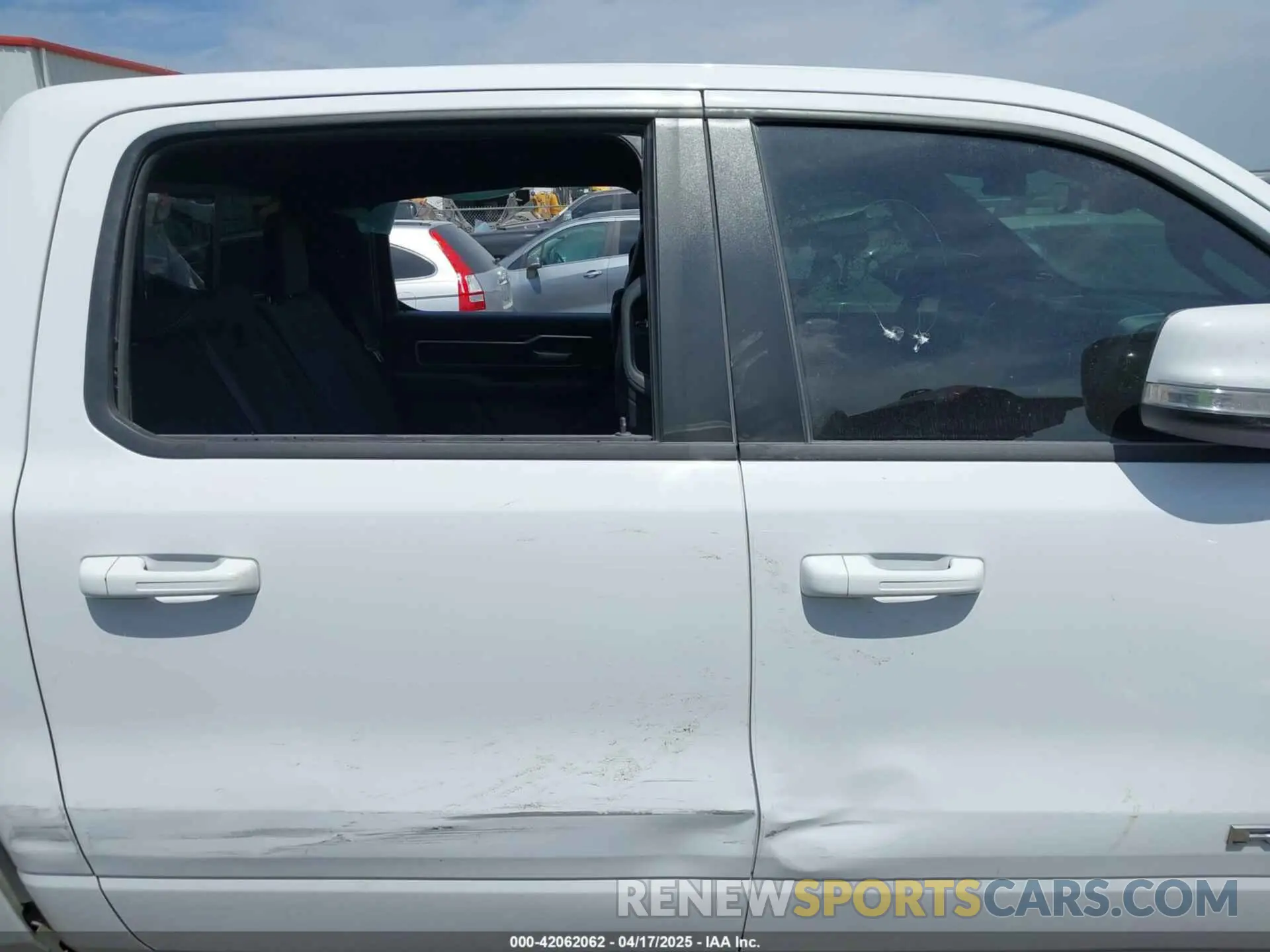 13 Photograph of a damaged car 1C6RREFT3NN372896 RAM 1500 2022
