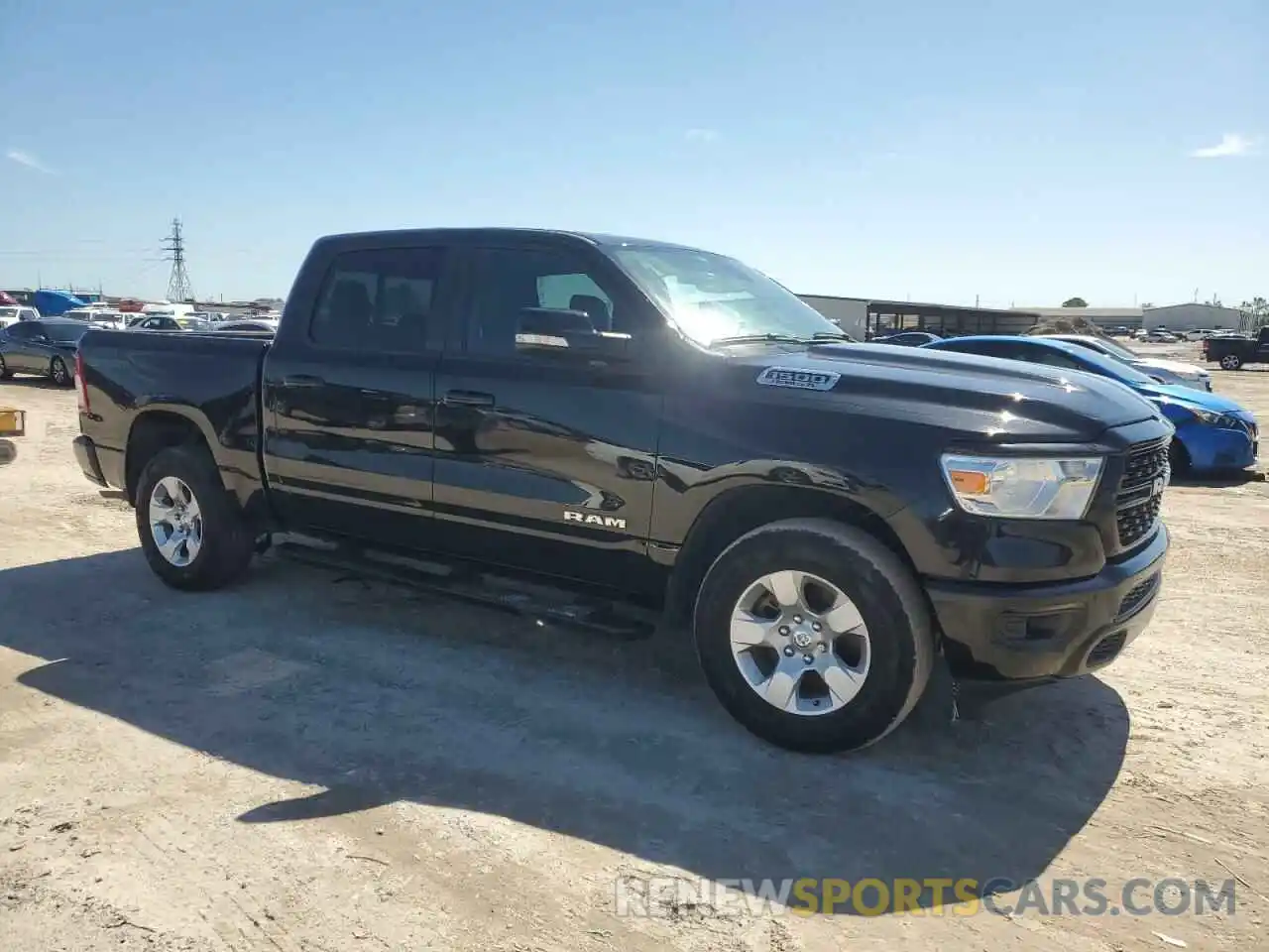 4 Photograph of a damaged car 1C6RREFT3NN431140 RAM 1500 2022