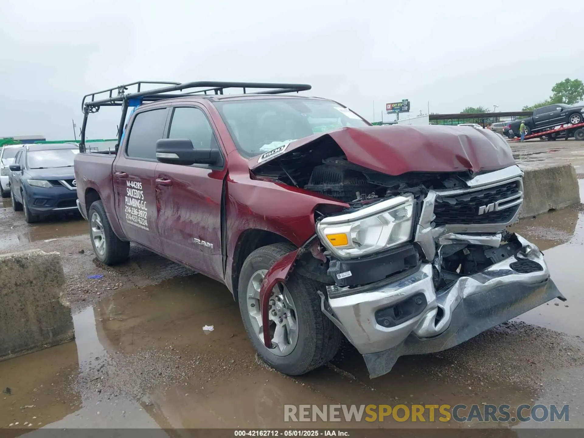 1 Photograph of a damaged car 1C6RREFT4NN119974 RAM 1500 2022