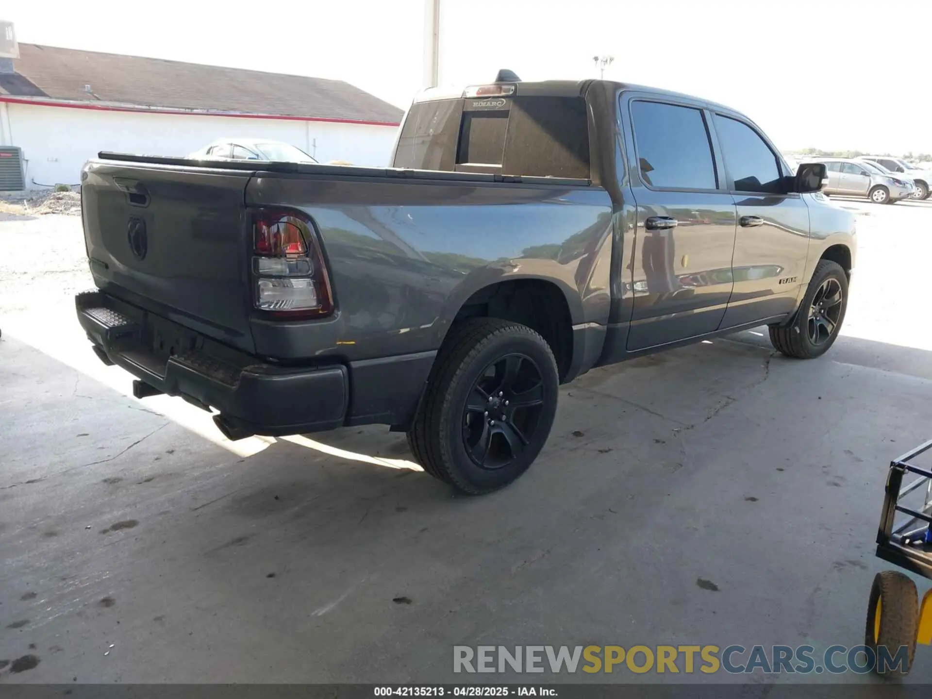 4 Photograph of a damaged car 1C6RREFT4NN218519 RAM 1500 2022