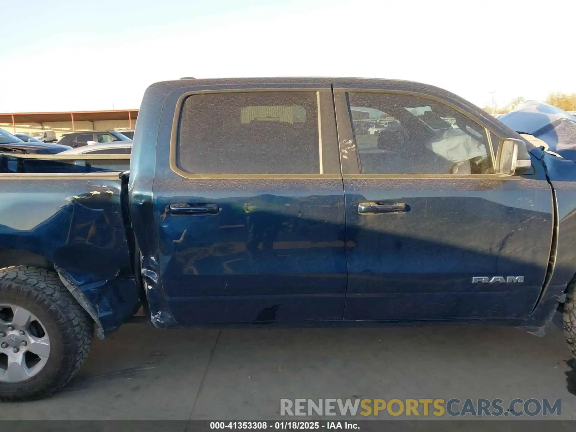 14 Photograph of a damaged car 1C6RREFT6NN201253 RAM 1500 2022