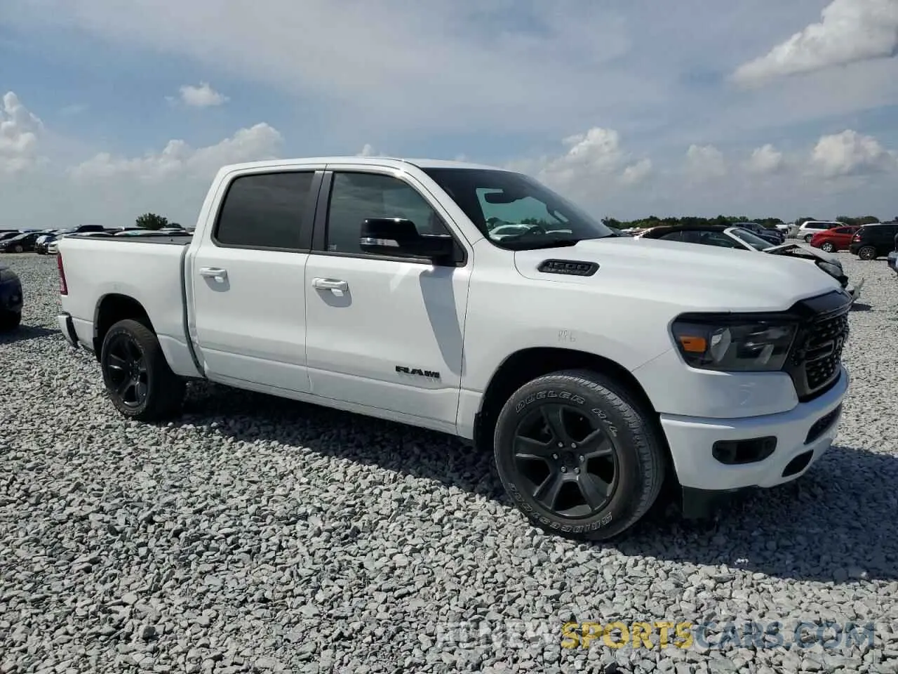 4 Photograph of a damaged car 1C6RREFT6NN312241 RAM 1500 2022