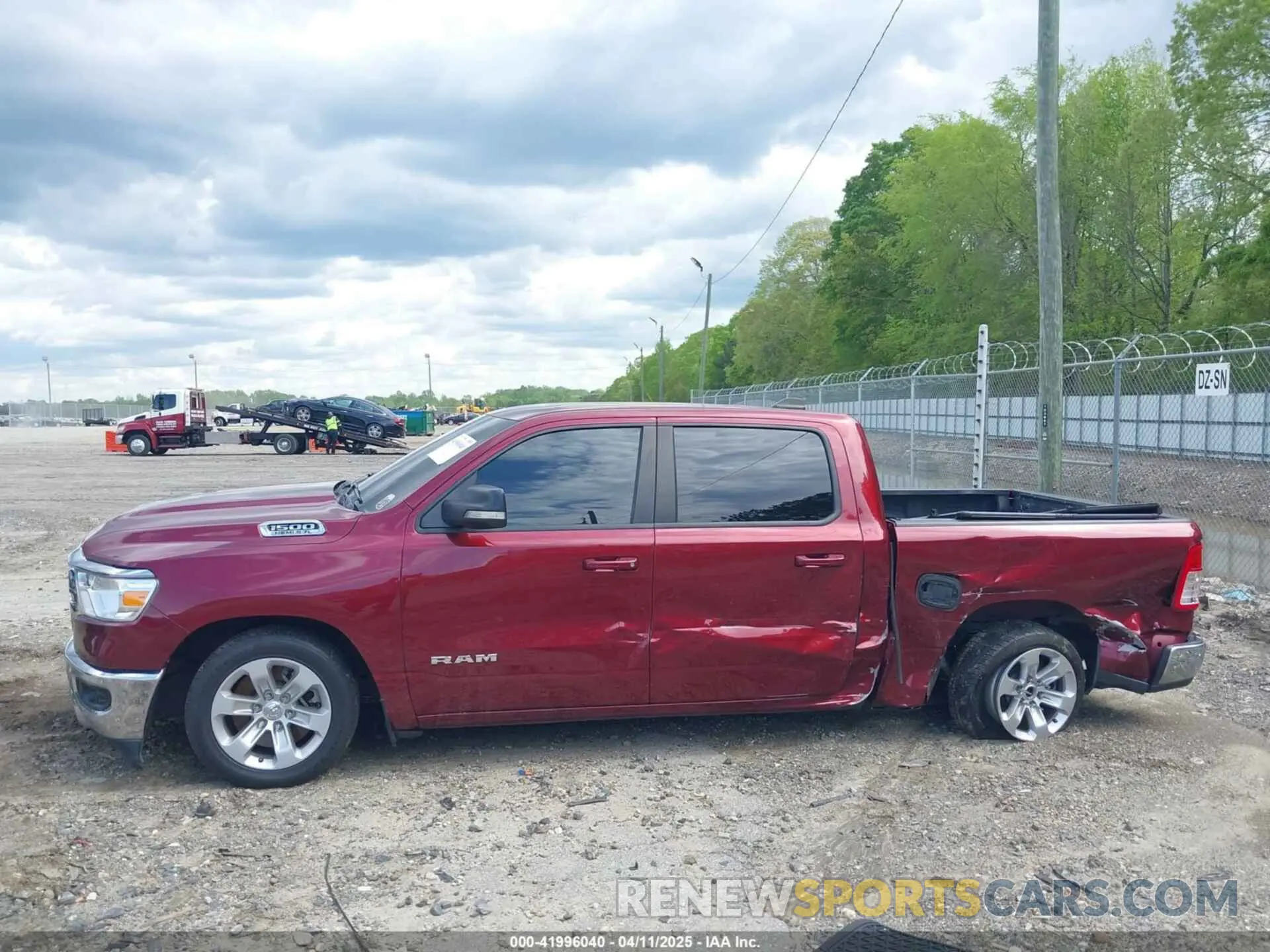 14 Photograph of a damaged car 1C6RREFT7NN105065 RAM 1500 2022
