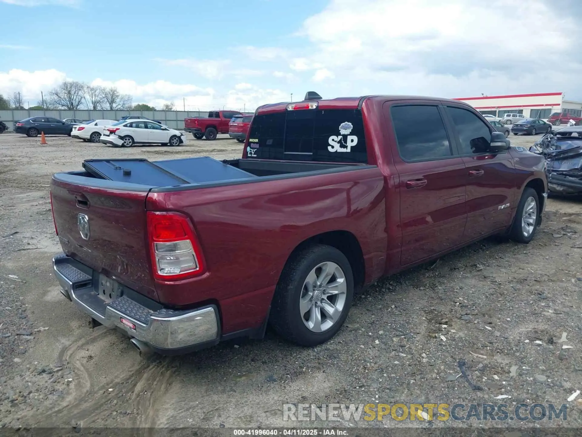 4 Photograph of a damaged car 1C6RREFT7NN105065 RAM 1500 2022