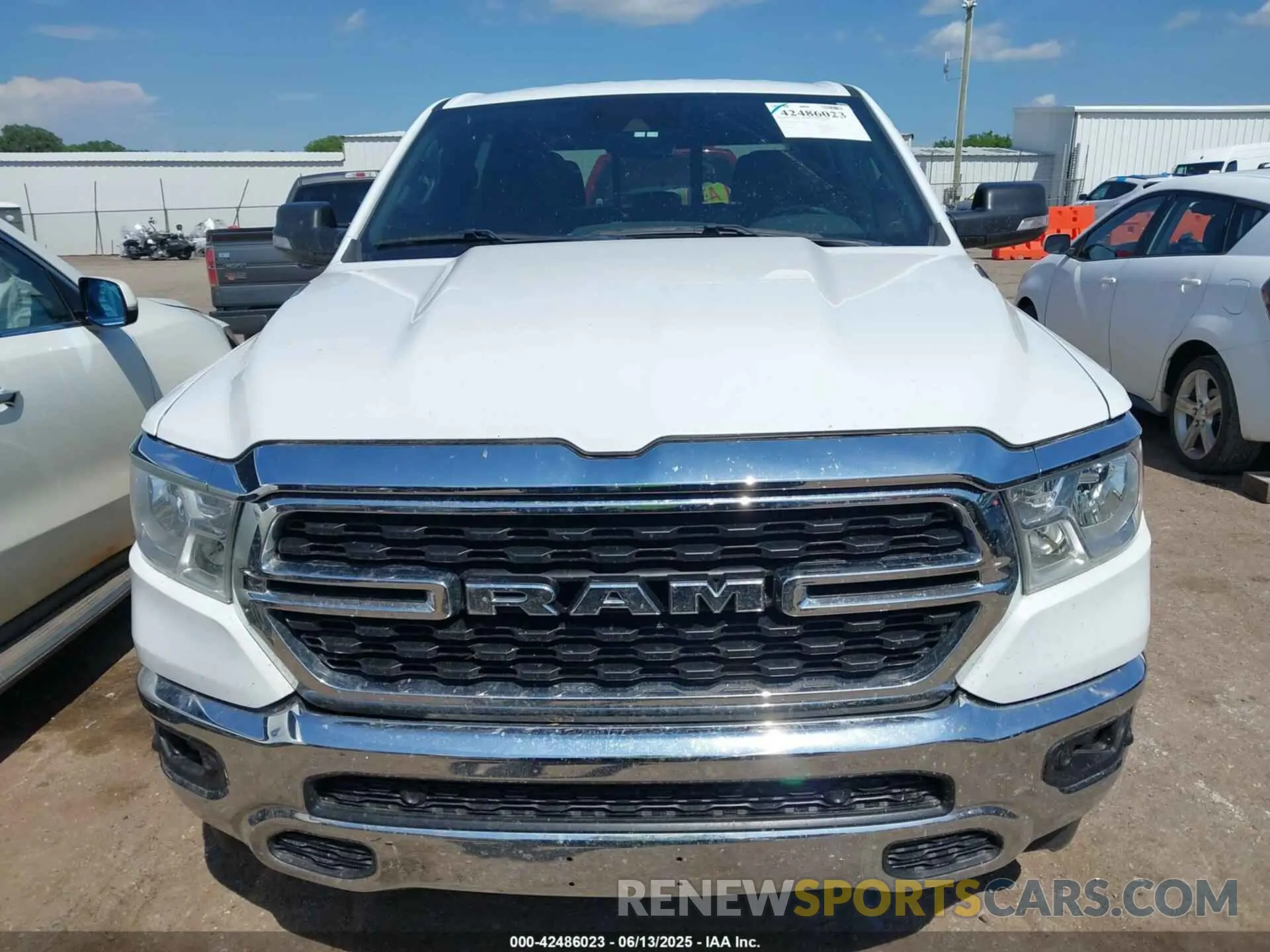 12 Photograph of a damaged car 1C6RREFT7NN337388 RAM 1500 2022