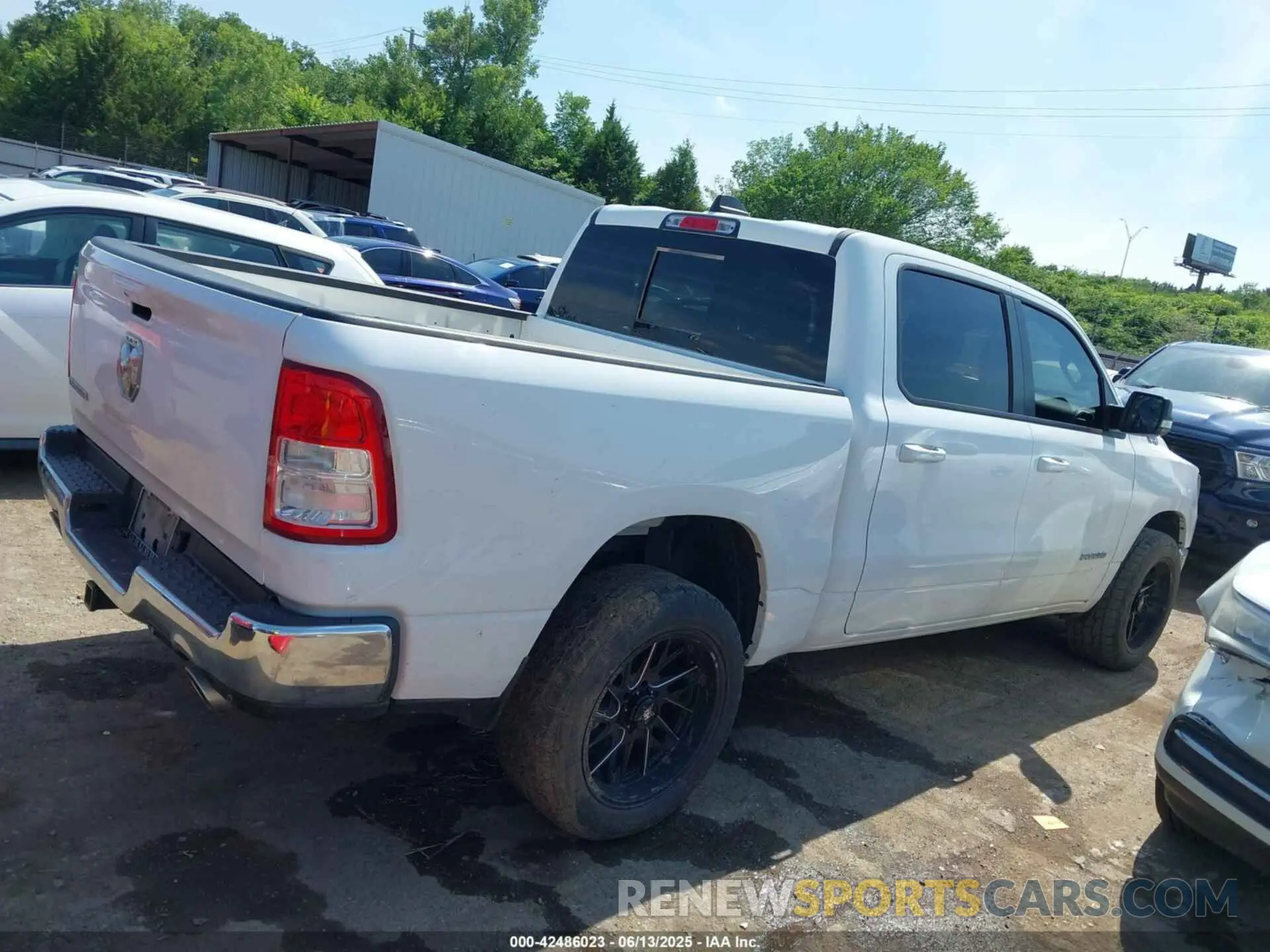 13 Photograph of a damaged car 1C6RREFT7NN337388 RAM 1500 2022