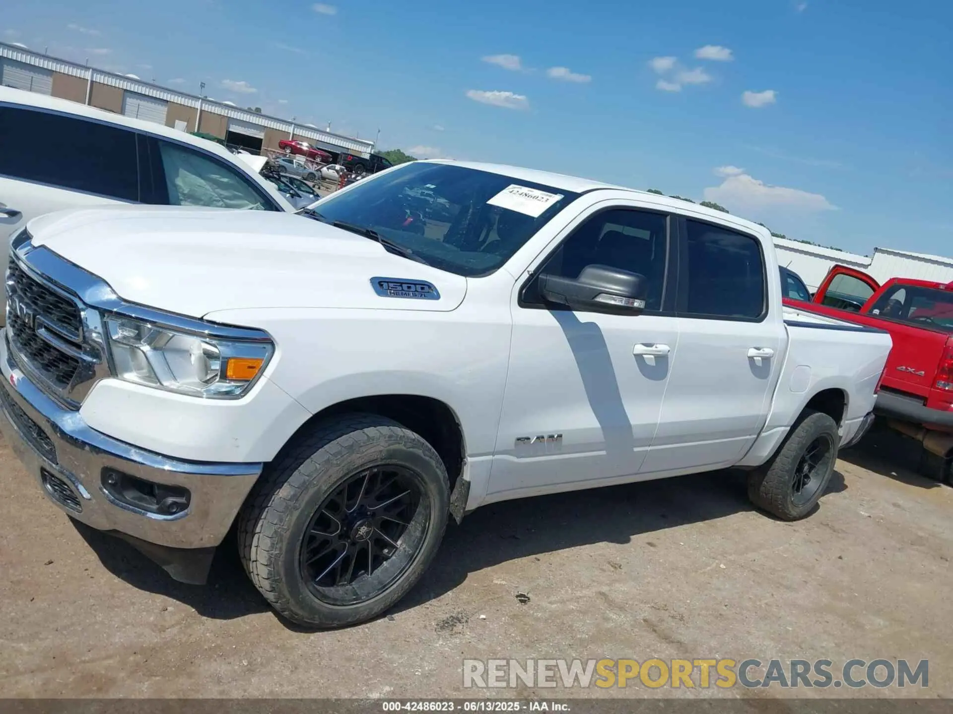 14 Photograph of a damaged car 1C6RREFT7NN337388 RAM 1500 2022