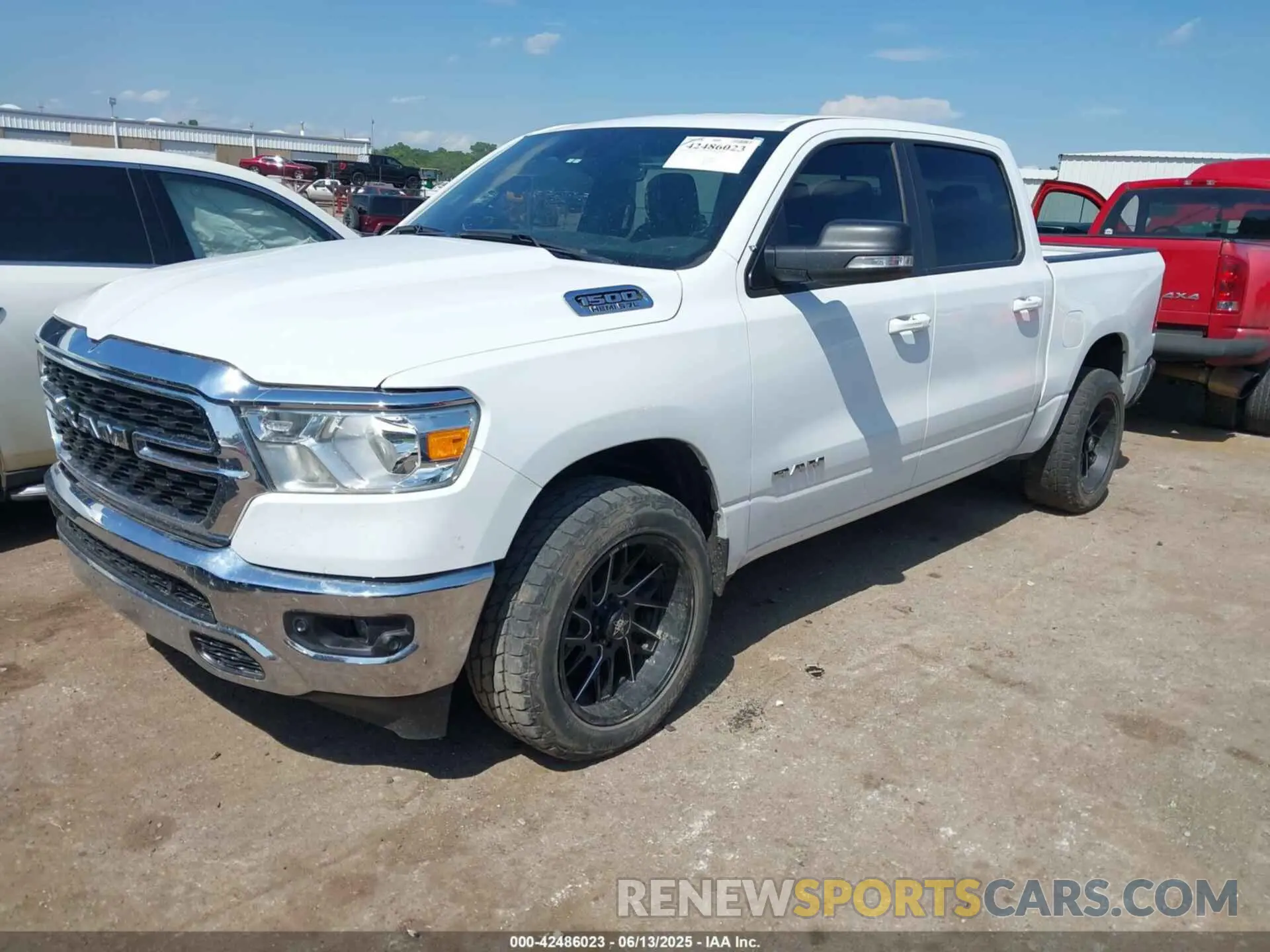 2 Photograph of a damaged car 1C6RREFT7NN337388 RAM 1500 2022