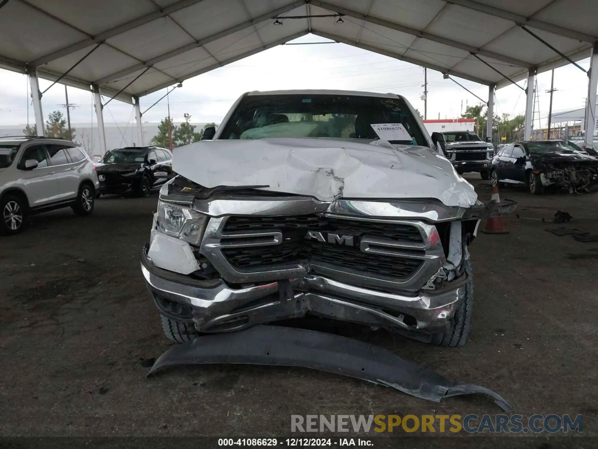 12 Photograph of a damaged car 1C6RREFT8NN350733 RAM 1500 2022