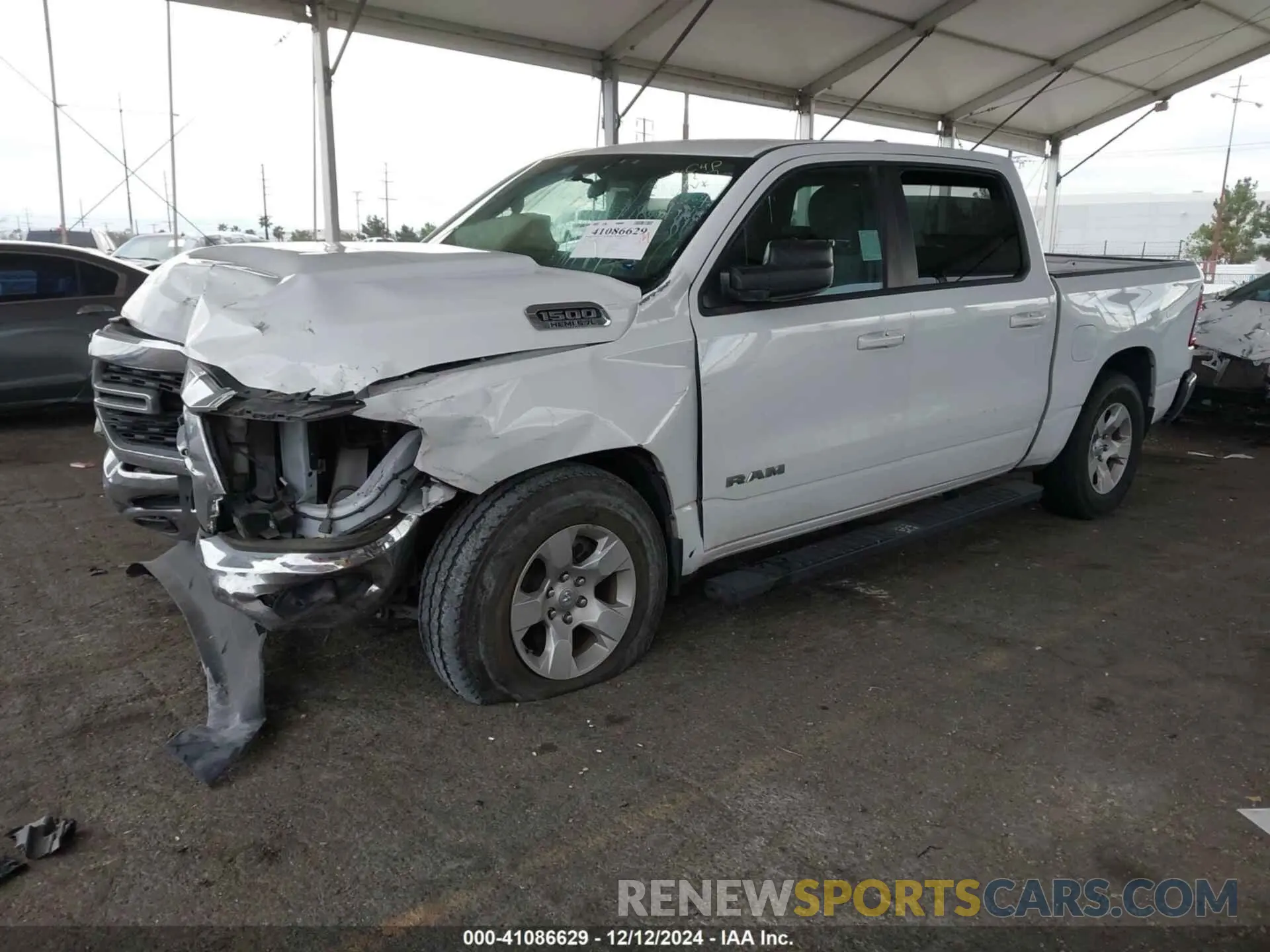 2 Photograph of a damaged car 1C6RREFT8NN350733 RAM 1500 2022