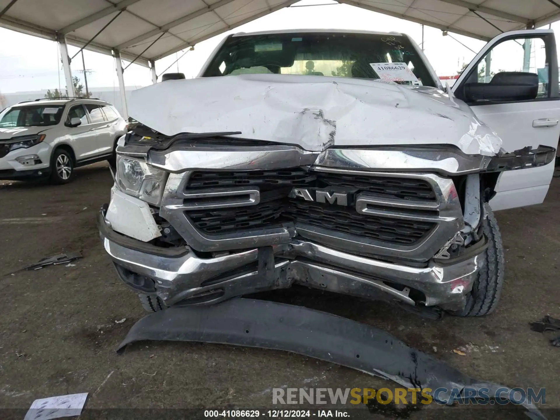 6 Photograph of a damaged car 1C6RREFT8NN350733 RAM 1500 2022