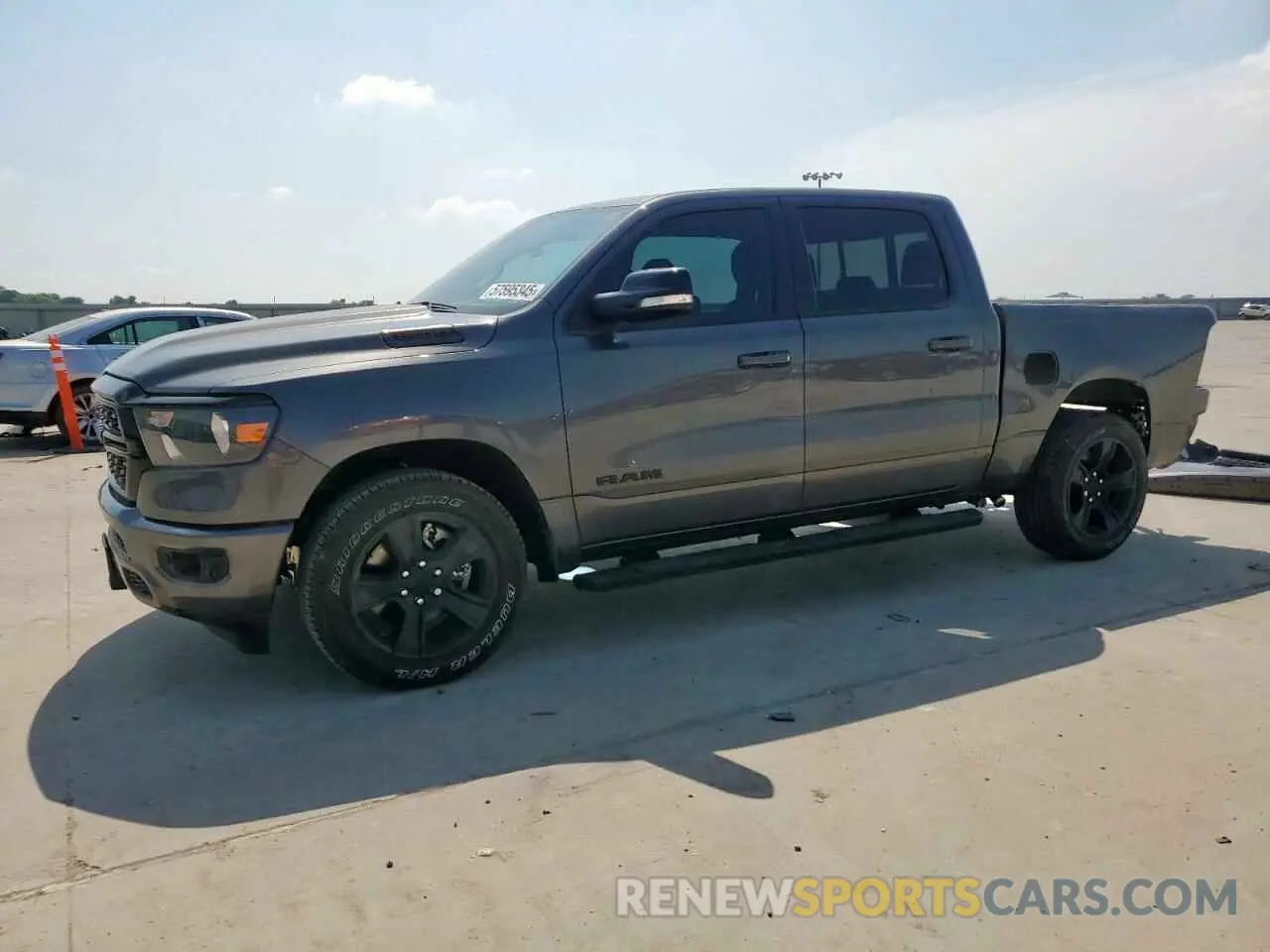 1 Photograph of a damaged car 1C6RREFTXNN113760 RAM 1500 2022