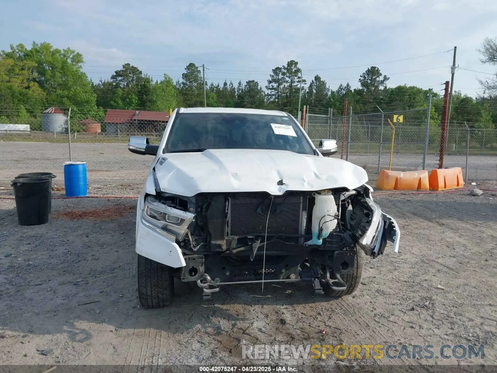 12 Photograph of a damaged car 1C6RREHT0NN187749 RAM 1500 2022